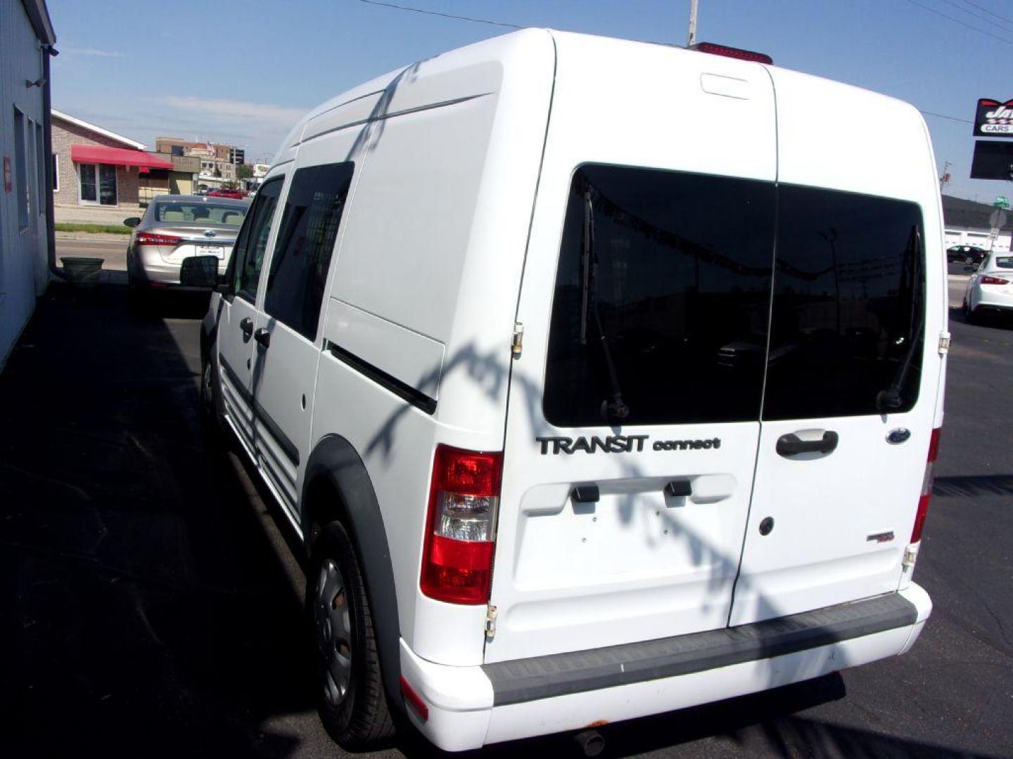 2012 WHITE FORD TRANSIT CONNECT XLT (NM0LS6BN9CT) with an 2.0L engine, Automatic transmission, located at 501 E. Columbia St., Springfield, OH, 45503, (800) 262-7122, 39.925262, -83.801796 - Photo#9