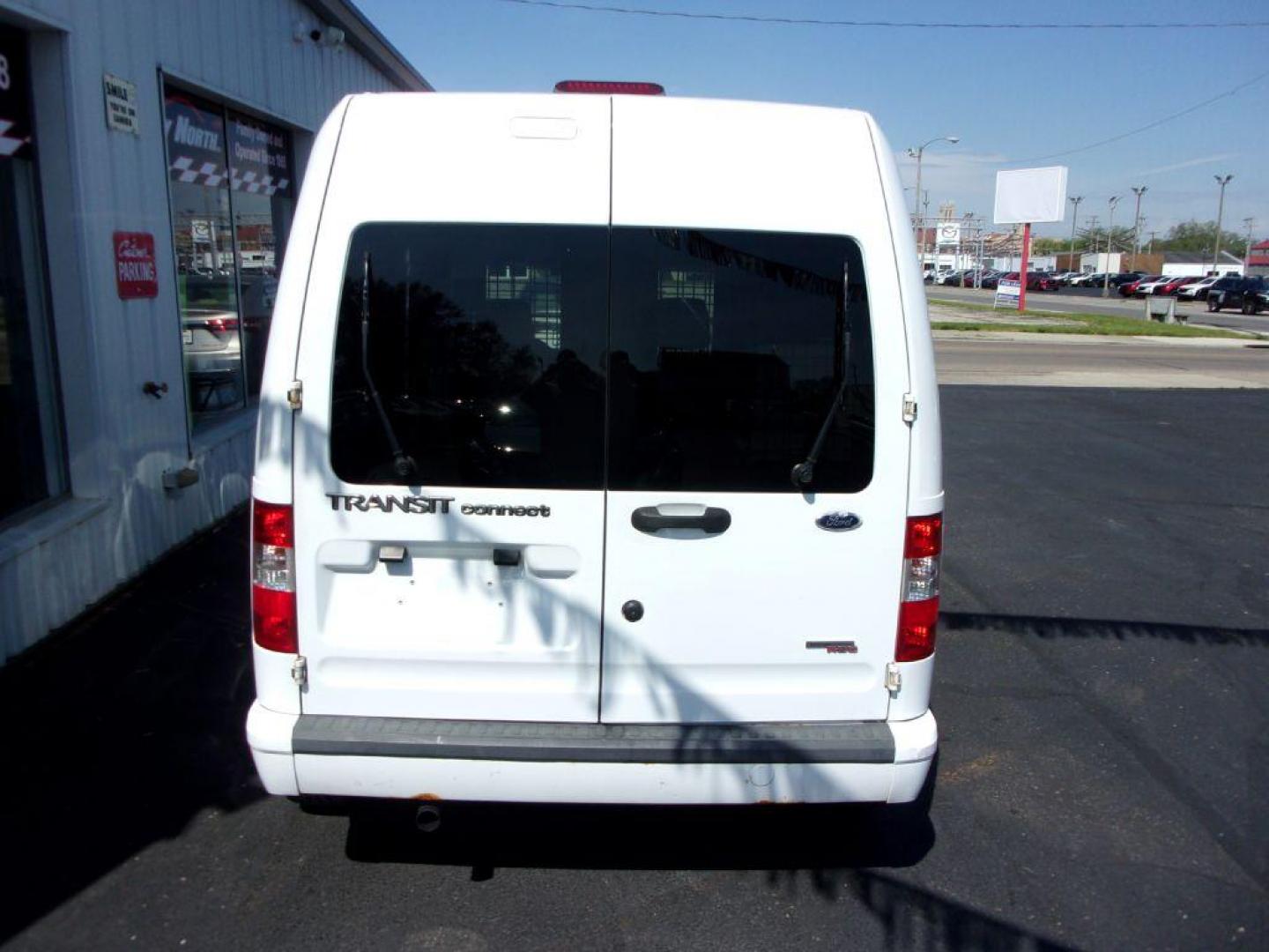 2012 WHITE FORD TRANSIT CONNECT XLT (NM0LS6BN9CT) with an 2.0L engine, Automatic transmission, located at 501 E. Columbia St., Springfield, OH, 45503, (800) 262-7122, 39.925262, -83.801796 - Photo#7