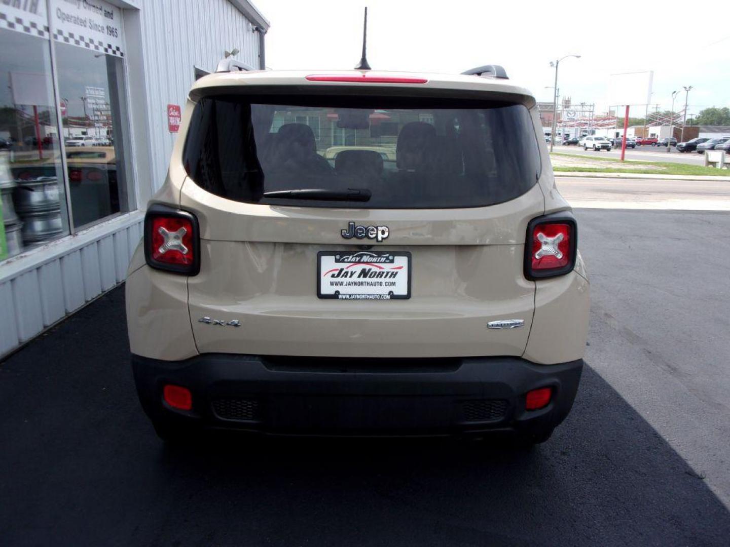 2015 TAN JEEP RENEGADE LATITUDE (ZACCJBBH0FP) with an 1.4L engine, 6-Speed Manual transmission, located at 501 E. Columbia St., Springfield, OH, 45503, (800) 262-7122, 39.925262, -83.801796 - Photo#4