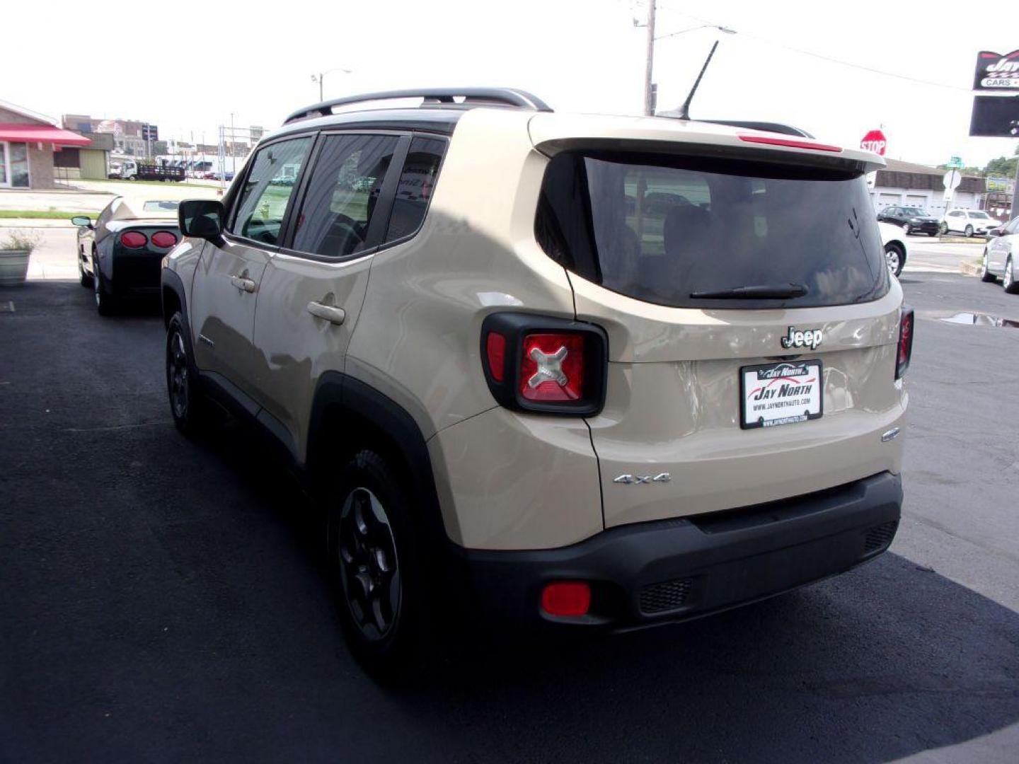 2015 TAN JEEP RENEGADE LATITUDE (ZACCJBBH0FP) with an 1.4L engine, 6-Speed Manual transmission, located at 501 E. Columbia St., Springfield, OH, 45503, (800) 262-7122, 39.925262, -83.801796 - Photo#5