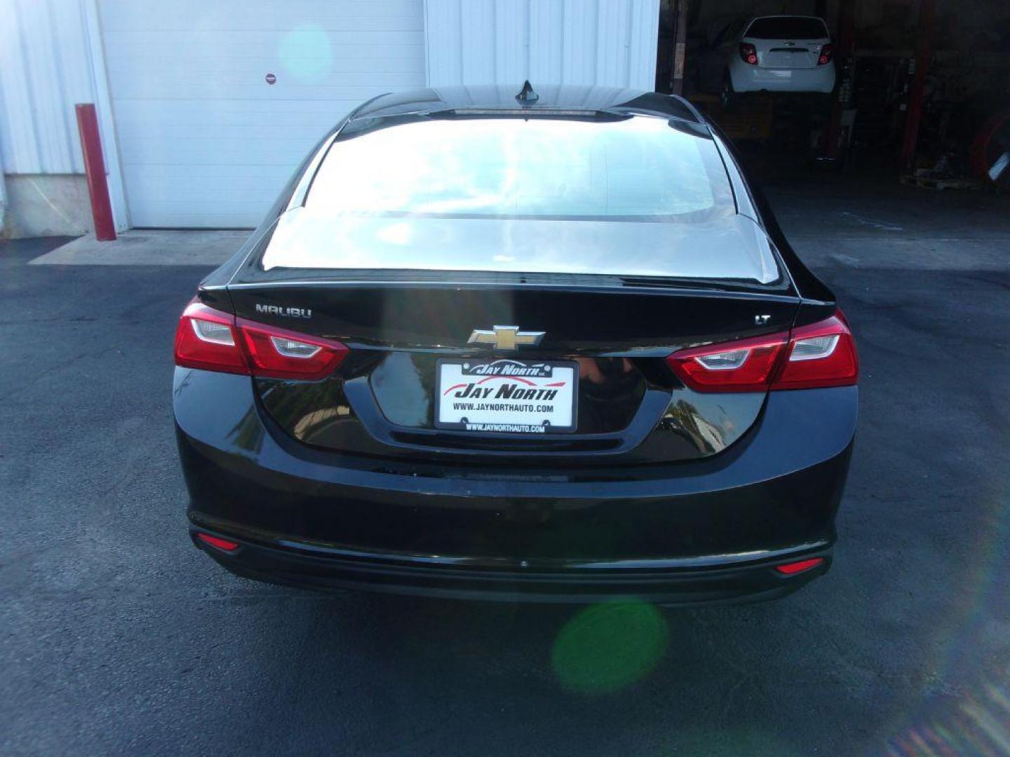 2018 BLACK CHEVROLET MALIBU LT (1G1ZD5ST6JF) with an 1.5L engine, Automatic transmission, located at 501 E. Columbia St., Springfield, OH, 45503, (800) 262-7122, 39.925262, -83.801796 - Photo#5