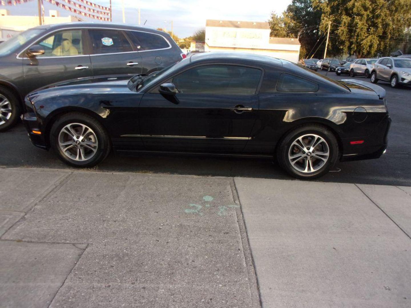 2014 BLACK FORD MUSTANG PREMIUM (1ZVBP8AM9E5) with an 3.7L engine, Automatic transmission, located at 501 E. Columbia St., Springfield, OH, 45503, (800) 262-7122, 39.925262, -83.801796 - Photo#0