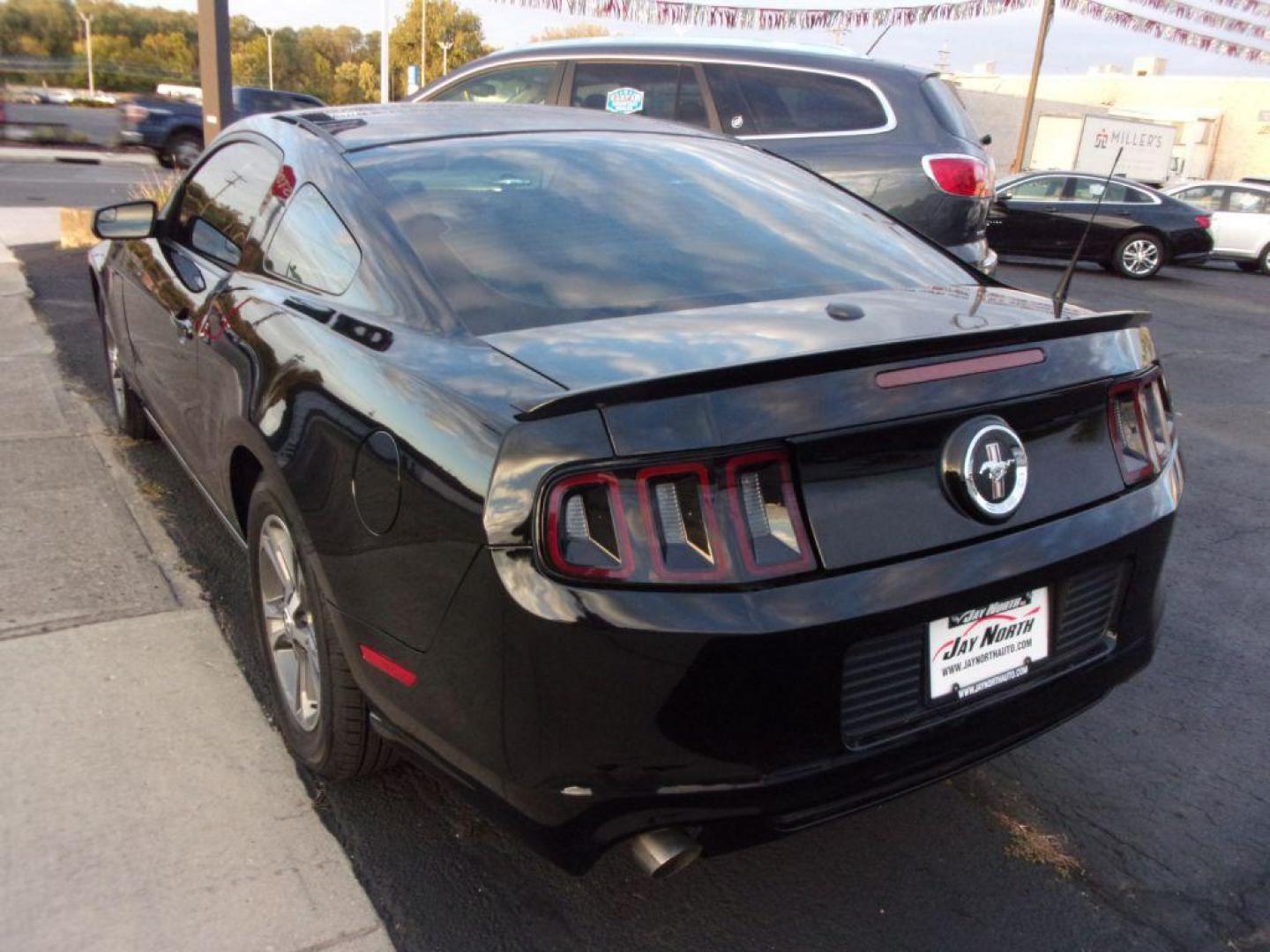 2014 BLACK FORD MUSTANG PREMIUM (1ZVBP8AM9E5) with an 3.7L engine, Automatic transmission, located at 501 E. Columbia St., Springfield, OH, 45503, (800) 262-7122, 39.925262, -83.801796 - Photo#4