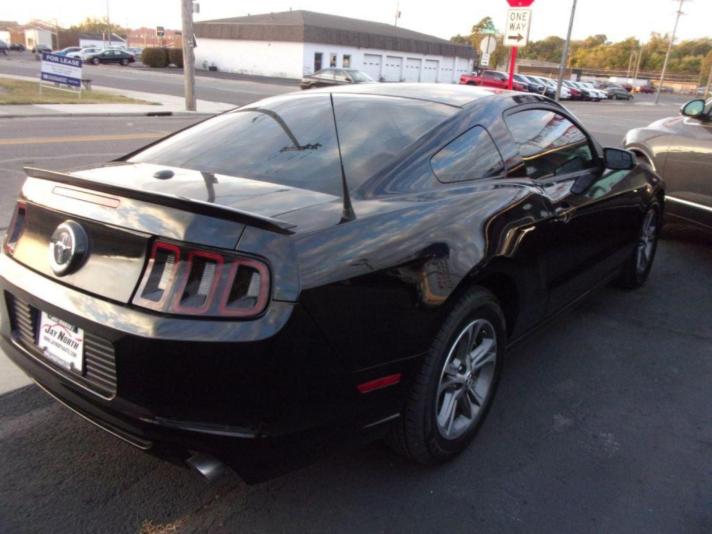 2014 BLACK FORD MUSTANG PREMIUM (1ZVBP8AM9E5) with an 3.7L engine, Automatic transmission, located at 501 E. Columbia St., Springfield, OH, 45503, (800) 262-7122, 39.925262, -83.801796 - Photo#6