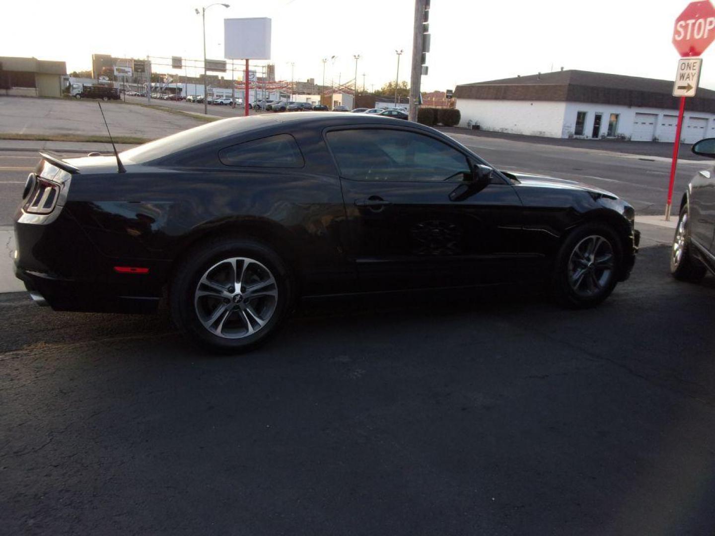 2014 BLACK FORD MUSTANG PREMIUM (1ZVBP8AM9E5) with an 3.7L engine, Automatic transmission, located at 501 E. Columbia St., Springfield, OH, 45503, (800) 262-7122, 39.925262, -83.801796 - Photo#7