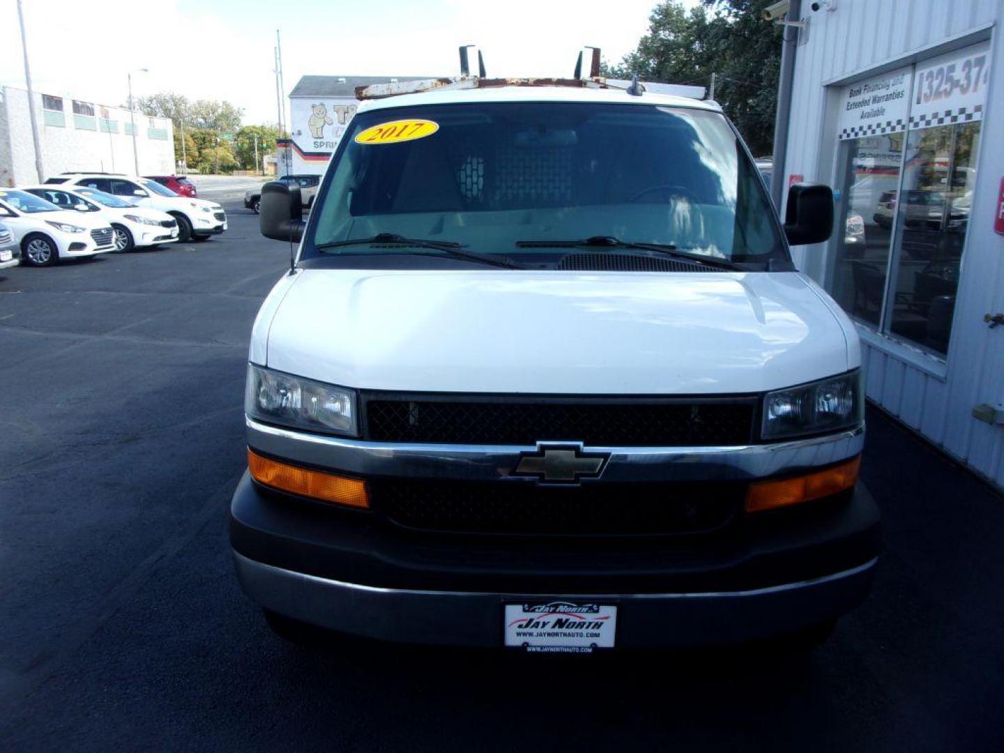 2017 WHITE CHEVROLET EXPRESS G2500 CARGO (1GCWGAFF8H1) with an 4.8L engine, Automatic transmission, located at 501 E. Columbia St., Springfield, OH, 45503, (800) 262-7122, 39.925262, -83.801796 - *** 1 Owner *** Clean Carfax W/ 18 Service Records *** Roof Rack *** Racks and Bins *** Jay North Auto has offered hand picked vehicles since 1965! Our customer's enjoy a NO pressure buying experience with a small town feel. All of our vehicles get fully inspected and detailed. We are a preferr - Photo#1