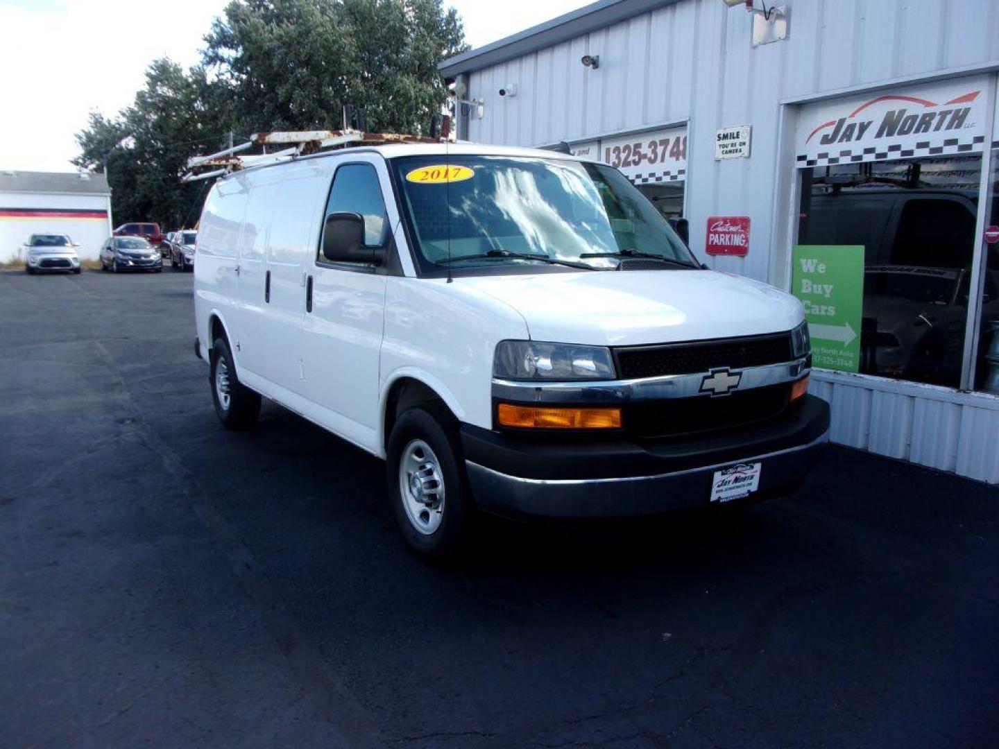 2017 WHITE CHEVROLET EXPRESS G2500 CARGO (1GCWGAFF8H1) with an 4.8L engine, Automatic transmission, located at 501 E. Columbia St., Springfield, OH, 45503, (800) 262-7122, 39.925262, -83.801796 - *** 1 Owner *** Clean Carfax W/ 18 Service Records *** Roof Rack *** Racks and Bins *** Jay North Auto has offered hand picked vehicles since 1965! Our customer's enjoy a NO pressure buying experience with a small town feel. All of our vehicles get fully inspected and detailed. We are a preferr - Photo#2