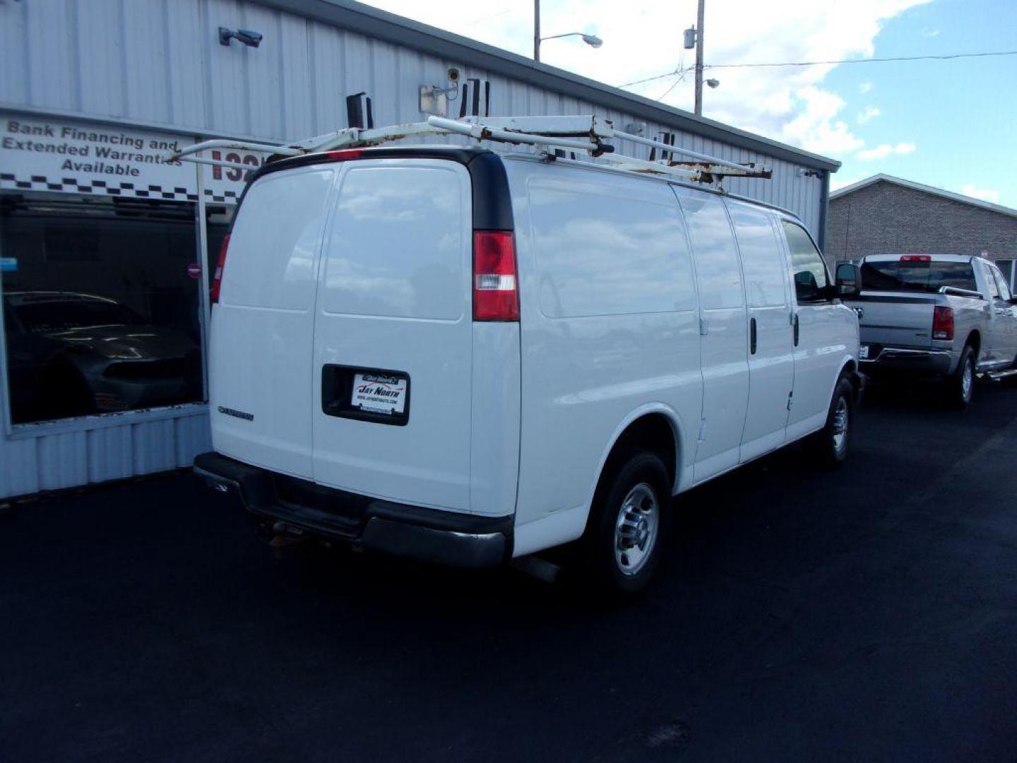 2017 WHITE CHEVROLET EXPRESS G2500 CARGO (1GCWGAFF8H1) with an 4.8L engine, Automatic transmission, located at 501 E. Columbia St., Springfield, OH, 45503, (800) 262-7122, 39.925262, -83.801796 - *** 1 Owner *** Clean Carfax W/ 18 Service Records *** Roof Rack *** Racks and Bins *** Jay North Auto has offered hand picked vehicles since 1965! Our customer's enjoy a NO pressure buying experience with a small town feel. All of our vehicles get fully inspected and detailed. We are a preferr - Photo#3