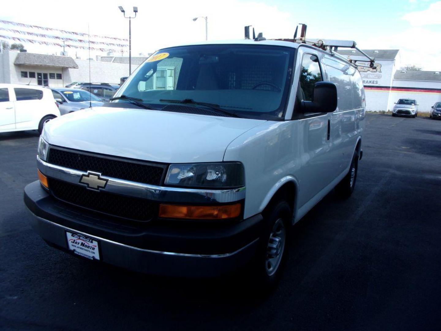 2017 WHITE CHEVROLET EXPRESS G2500 CARGO (1GCWGAFF8H1) with an 4.8L engine, Automatic transmission, located at 501 E. Columbia St., Springfield, OH, 45503, (800) 262-7122, 39.925262, -83.801796 - *** 1 Owner *** Clean Carfax W/ 18 Service Records *** Roof Rack *** Racks and Bins *** Jay North Auto has offered hand picked vehicles since 1965! Our customer's enjoy a NO pressure buying experience with a small town feel. All of our vehicles get fully inspected and detailed. We are a preferr - Photo#6