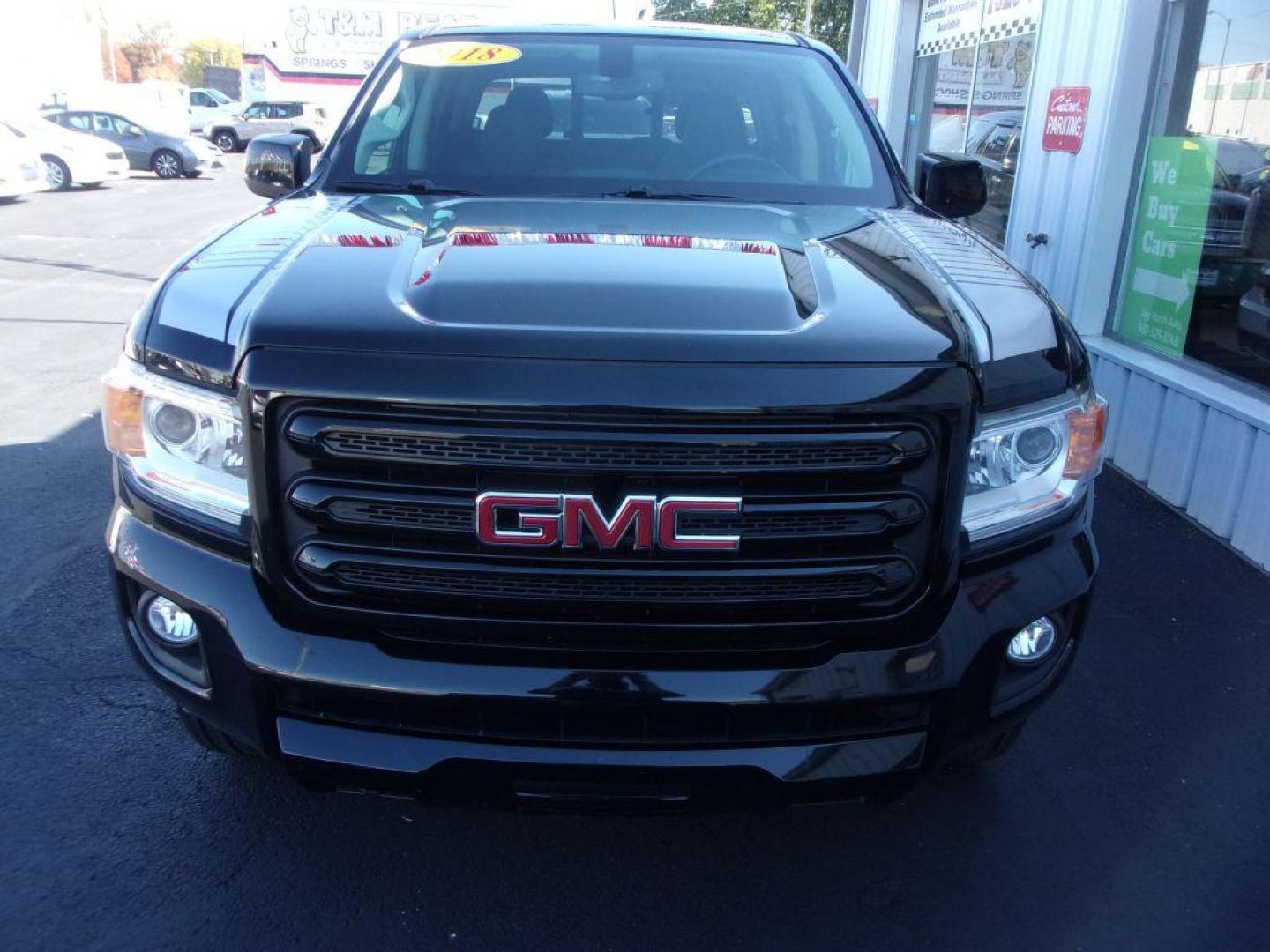 2018 BLACK GMC CANYON SLE (1GTG6CEN1J1) with an 3.6L engine, Automatic transmission, located at 501 E. Columbia St., Springfield, OH, 45503, (800) 262-7122, 39.925262, -83.801796 - *** New Goodyear Tires *** All Terrain Package *** 3.6L V6 *** Bose Audio *** Serviced and Detailed *** Bed Cover *** Bed Liner *** Tow Package *** Remote Start *** All Weather Mats *** NICE!!!! *** Jay North Auto has offered hand picked vehicles since 1965! Our customer's enjoy a NO pressure buy - Photo#2