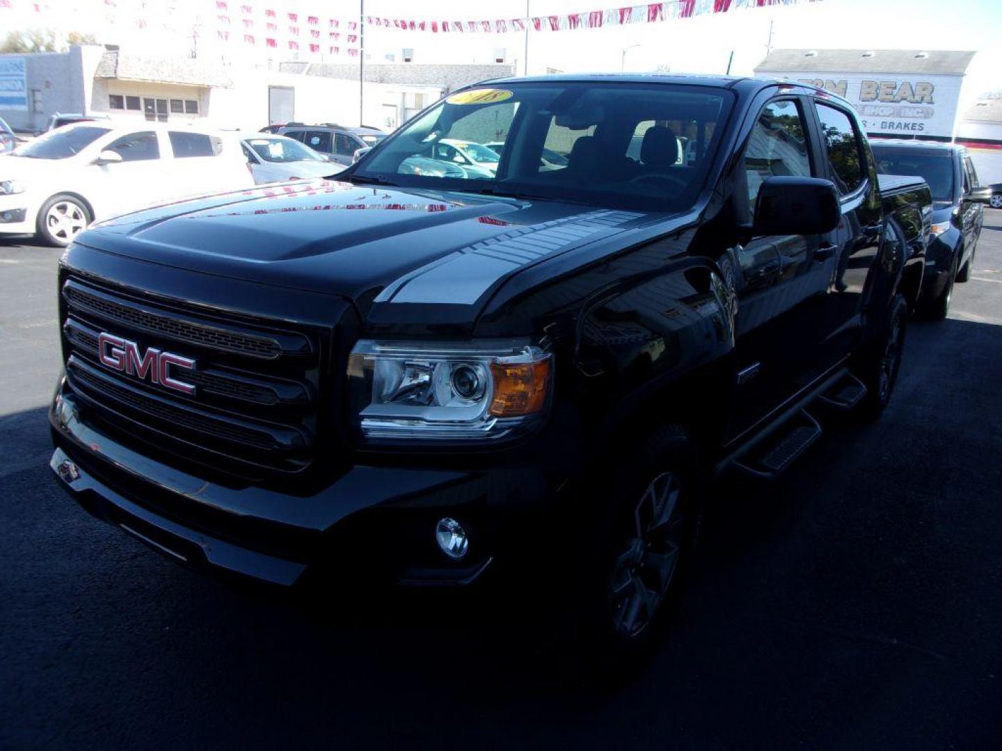 2018 BLACK GMC CANYON SLE (1GTG6CEN1J1) with an 3.6L engine, Automatic transmission, located at 501 E. Columbia St., Springfield, OH, 45503, (800) 262-7122, 39.925262, -83.801796 - *** New Goodyear Tires *** All Terrain Package *** 3.6L V6 *** Bose Audio *** Serviced and Detailed *** Bed Cover *** Bed Liner *** Tow Package *** Remote Start *** All Weather Mats *** NICE!!!! *** Jay North Auto has offered hand picked vehicles since 1965! Our customer's enjoy a NO pressure buy - Photo#3