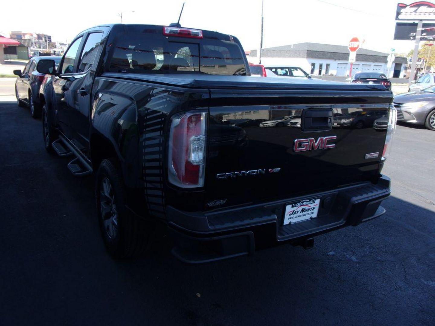 2018 BLACK GMC CANYON SLE (1GTG6CEN1J1) with an 3.6L engine, Automatic transmission, located at 501 E. Columbia St., Springfield, OH, 45503, (800) 262-7122, 39.925262, -83.801796 - *** New Goodyear Tires *** All Terrain Package *** 3.6L V6 *** Bose Audio *** Serviced and Detailed *** Bed Cover *** Bed Liner *** Tow Package *** Remote Start *** All Weather Mats *** NICE!!!! *** Jay North Auto has offered hand picked vehicles since 1965! Our customer's enjoy a NO pressure buy - Photo#4