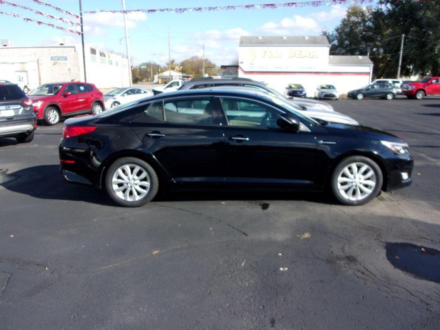 2015 BLACK KIA OPTIMA EX (5XXGN4A77FG) with an 2.4L engine, Automatic transmission, located at 501 E. Columbia St., Springfield, OH, 45503, (800) 262-7122, 39.925262, -83.801796 - *** New Tires *** EX *** Leather *** Panoramic Moonroof *** Premium Audio *** Serviced and Detailed *** Jay North Auto has offered hand picked vehicles since 1965! Our customer's enjoy a NO pressure buying experience with a small town feel. All of our vehicles get fully inspected and detailed. W - Photo#0