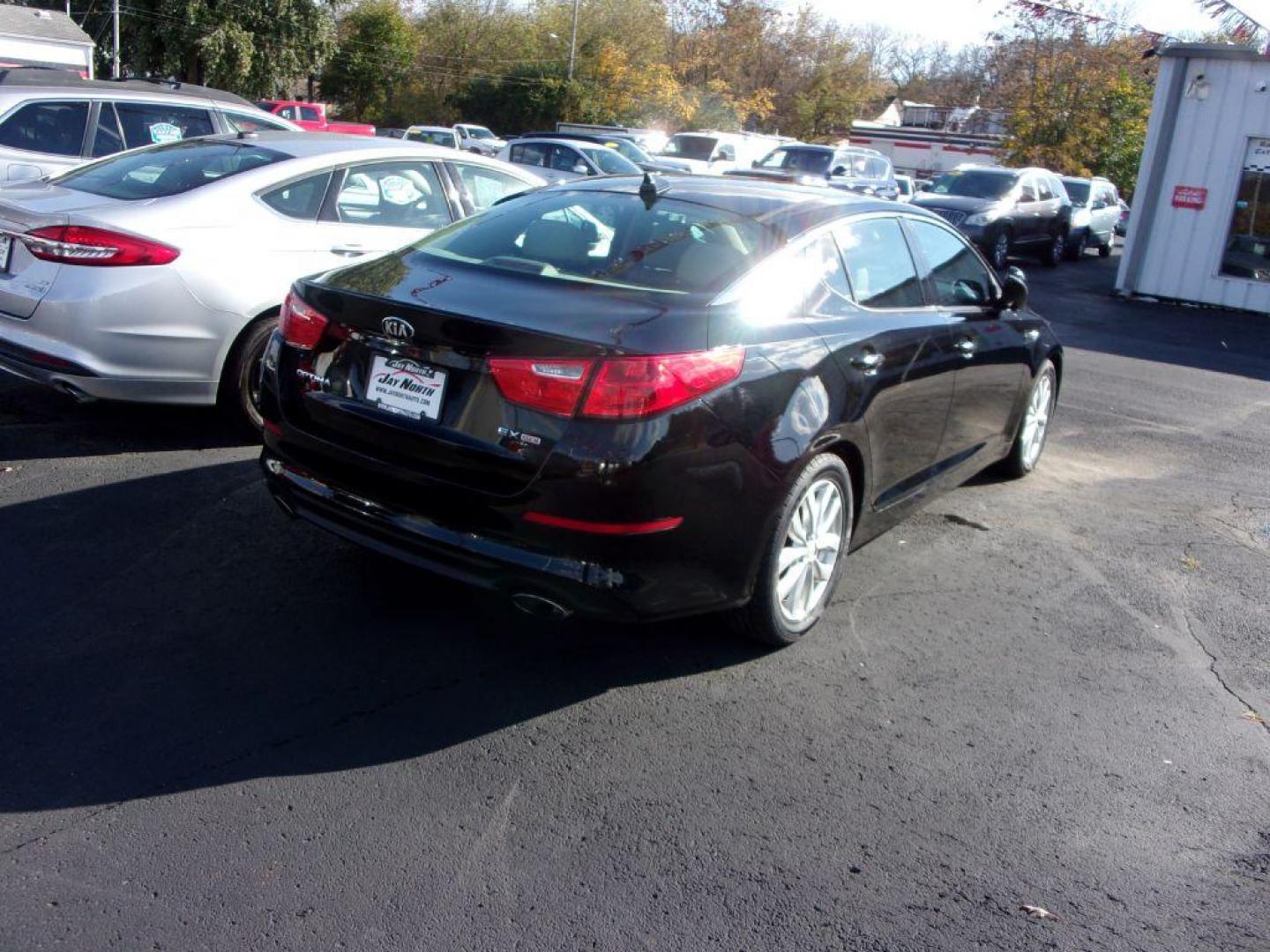 2015 BLACK KIA OPTIMA EX (5XXGN4A77FG) with an 2.4L engine, Automatic transmission, located at 501 E. Columbia St., Springfield, OH, 45503, (800) 262-7122, 39.925262, -83.801796 - *** New Tires *** EX *** Leather *** Panoramic Moonroof *** Premium Audio *** Serviced and Detailed *** Jay North Auto has offered hand picked vehicles since 1965! Our customer's enjoy a NO pressure buying experience with a small town feel. All of our vehicles get fully inspected and detailed. W - Photo#3