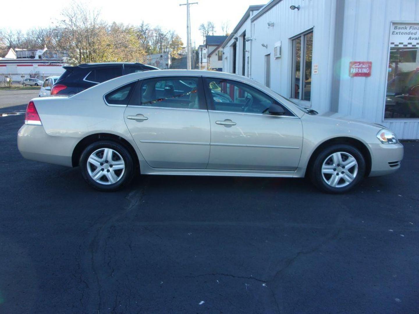 2010 GOLD CHEVROLET IMPALA LS (2G1WA5EKXA1) with an 3.5L engine, Automatic transmission, located at 501 E. Columbia St., Springfield, OH, 45503, (800) 262-7122, 39.925262, -83.801796 - Photo#0