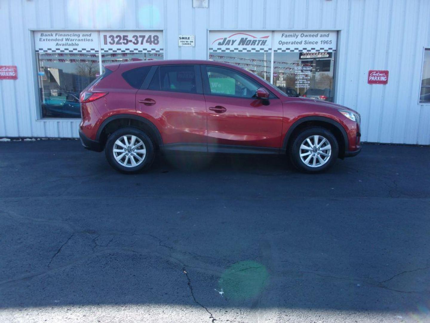 2013 RED MAZDA CX-5 TOURING (JM3KE4CE1D0) with an 2.0L engine, Automatic transmission, located at 501 E. Columbia St., Springfield, OH, 45503, (800) 262-7122, 39.925262, -83.801796 - ***1-Owner***AWD***Touring***Bose Sound System***Sunroof***Serviced and Detailed*** Jay North Auto has offered hand picked vehicles since 1965! Our customer's enjoy a NO pressure buying experience with a small town feel. All of our vehicles get fully inspected and detailed. We are a preferred de - Photo#0