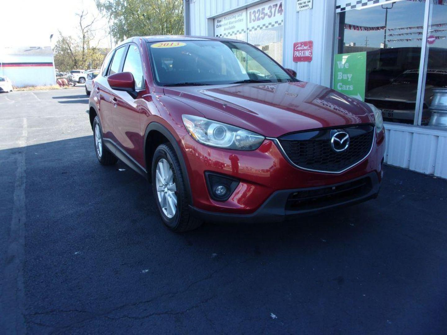 2013 RED MAZDA CX-5 TOURING (JM3KE4CE1D0) with an 2.0L engine, Automatic transmission, located at 501 E. Columbia St., Springfield, OH, 45503, (800) 262-7122, 39.925262, -83.801796 - ***1-Owner***AWD***Touring***Bose Sound System***Sunroof***Serviced and Detailed*** Jay North Auto has offered hand picked vehicles since 1965! Our customer's enjoy a NO pressure buying experience with a small town feel. All of our vehicles get fully inspected and detailed. We are a preferred de - Photo#2