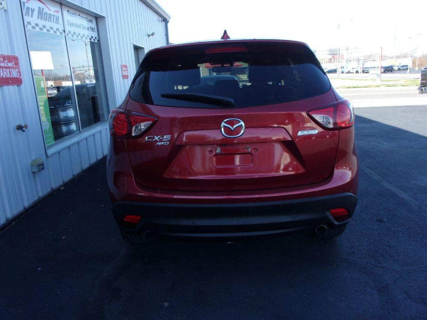 2013 RED MAZDA CX-5 TOURING (JM3KE4CE1D0) with an 2.0L engine, Automatic transmission, located at 501 E. Columbia St., Springfield, OH, 45503, (800) 262-7122, 39.925262, -83.801796 - ***1-Owner***AWD***Touring***Bose Sound System***Sunroof***Serviced and Detailed*** Jay North Auto has offered hand picked vehicles since 1965! Our customer's enjoy a NO pressure buying experience with a small town feel. All of our vehicles get fully inspected and detailed. We are a preferred de - Photo#4