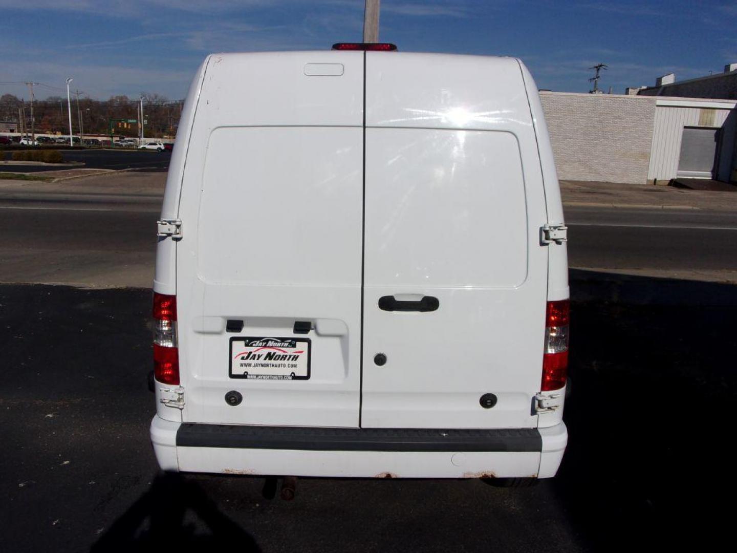 2011 WHITE FORD TRANSIT CONNECT XLT (NM0LS7BN9BT) with an 2.0L engine, Automatic transmission, located at 501 E. Columbia St., Springfield, OH, 45503, (800) 262-7122, 39.925262, -83.801796 - Photo#4