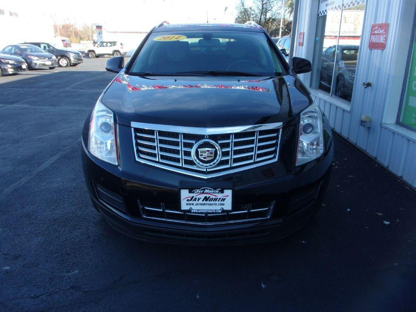 2014 BLACK CADILLAC SRX LUXURY COLLECTION (3GYFNBE32ES) with an 3.6L engine, Automatic transmission, located at 501 E. Columbia St., Springfield, OH, 45503, (800) 262-7122, 39.925262, -83.801796 - ***Clean Carfax***Panoramic Roof***Heated Leather Seating***Heated Steering Wheel***Blind Spot***New Tires***Navigation***Serviced and Detailed*** - Photo#1