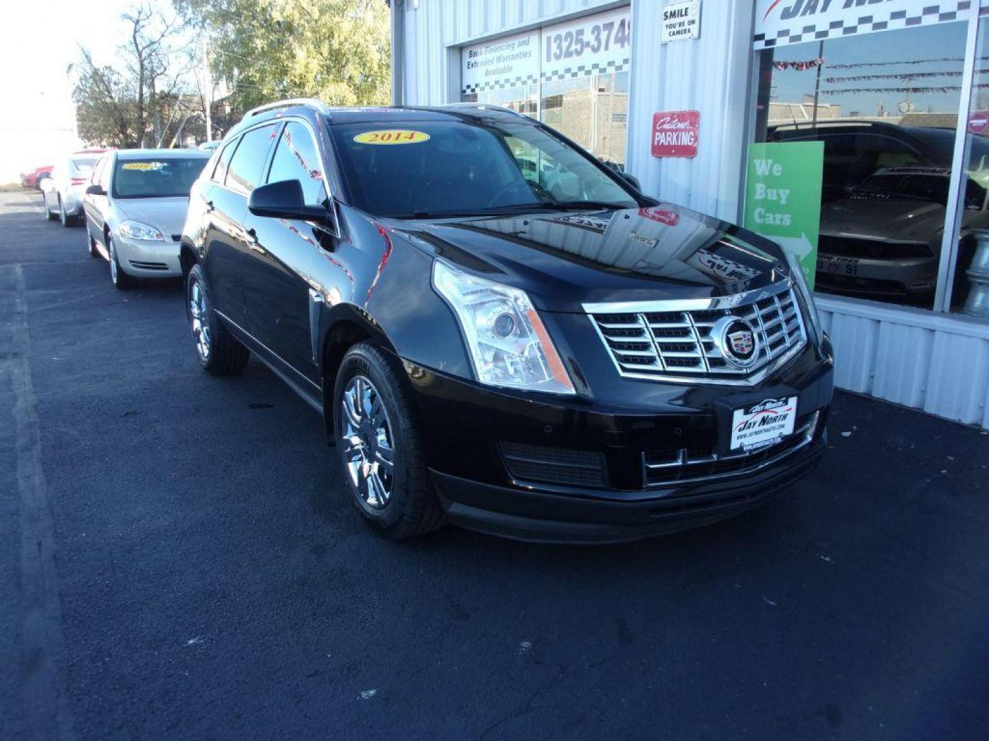 2014 BLACK CADILLAC SRX LUXURY COLLECTION (3GYFNBE32ES) with an 3.6L engine, Automatic transmission, located at 501 E. Columbia St., Springfield, OH, 45503, (800) 262-7122, 39.925262, -83.801796 - ***Clean Carfax***Panoramic Roof***Heated Leather Seating***Heated Steering Wheel***Blind Spot***New Tires***Navigation***Serviced and Detailed*** - Photo#2