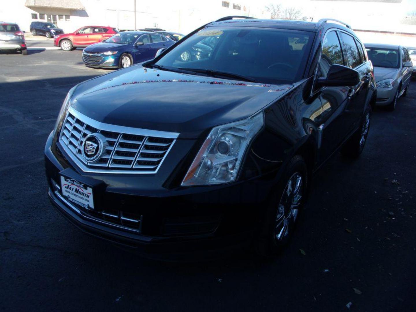 2014 BLACK CADILLAC SRX LUXURY COLLECTION (3GYFNBE32ES) with an 3.6L engine, Automatic transmission, located at 501 E. Columbia St., Springfield, OH, 45503, (800) 262-7122, 39.925262, -83.801796 - ***Clean Carfax***Panoramic Roof***Heated Leather Seating***Heated Steering Wheel***Blind Spot***New Tires***Navigation***Serviced and Detailed*** - Photo#6