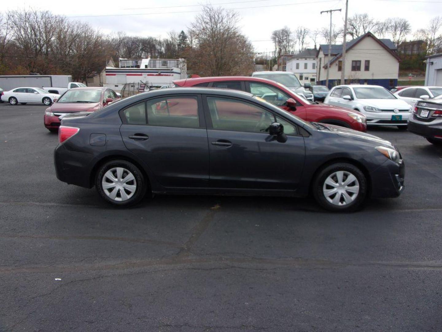 2016 GRAY SUBARU IMPREZA (JF1GJAA61GH) with an 2.0L engine, Continuously Variable transmission, located at 501 E. Columbia St., Springfield, OH, 45503, (800) 262-7122, 39.925262, -83.801796 - Photo#0