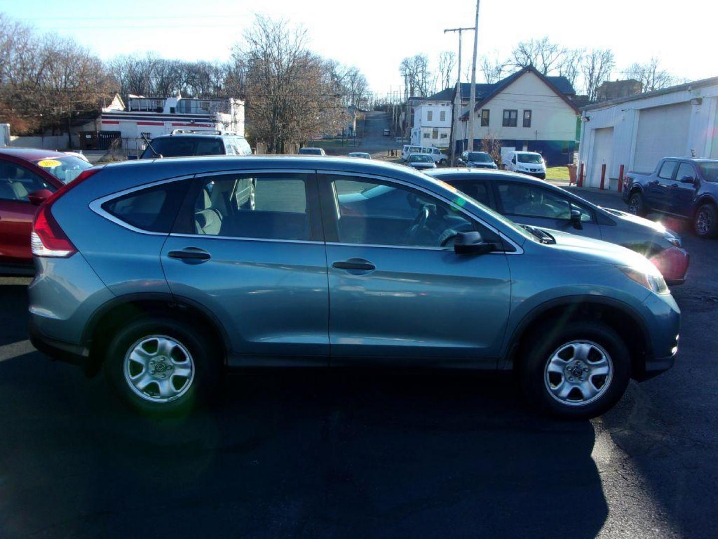 2014 BLUE HONDA CR-V LX (5J6RM4H36EL) with an 2.4L engine, Automatic transmission, located at 501 E. Columbia St., Springfield, OH, 45503, (800) 262-7122, 39.925262, -83.801796 - *** LX *** All Wheel Drive *** Serviced and Detailed *** Updated Timing Chain Service *** Jay North Auto has offered hand picked vehicles since 1965! Our customer's enjoy a NO pressure buying experience with a small town feel. All of our vehicles get fully inspected and detailed. We are a prefe - Photo#0