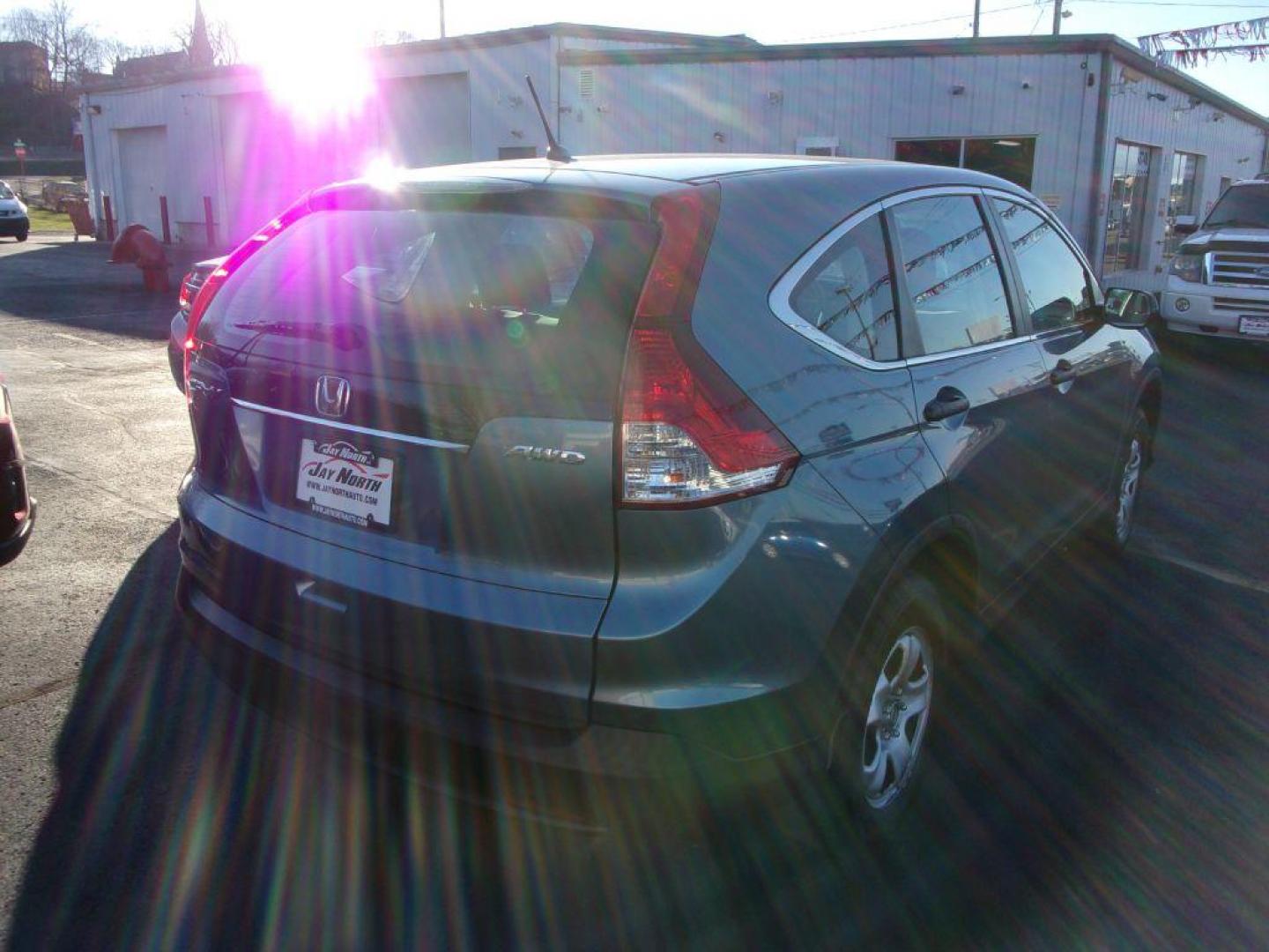 2014 BLUE HONDA CR-V LX (5J6RM4H36EL) with an 2.4L engine, Automatic transmission, located at 501 E. Columbia St., Springfield, OH, 45503, (800) 262-7122, 39.925262, -83.801796 - *** LX *** All Wheel Drive *** Serviced and Detailed *** Updated Timing Chain Service *** Jay North Auto has offered hand picked vehicles since 1965! Our customer's enjoy a NO pressure buying experience with a small town feel. All of our vehicles get fully inspected and detailed. We are a prefe - Photo#3