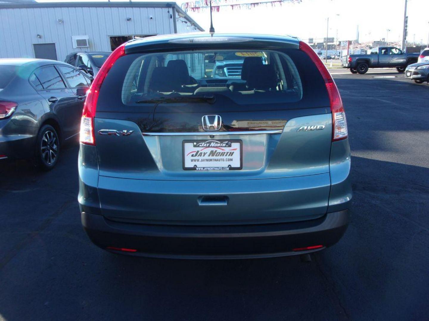 2014 BLUE HONDA CR-V LX (5J6RM4H36EL) with an 2.4L engine, Automatic transmission, located at 501 E. Columbia St., Springfield, OH, 45503, (800) 262-7122, 39.925262, -83.801796 - *** LX *** All Wheel Drive *** Serviced and Detailed *** Updated Timing Chain Service *** Jay North Auto has offered hand picked vehicles since 1965! Our customer's enjoy a NO pressure buying experience with a small town feel. All of our vehicles get fully inspected and detailed. We are a prefe - Photo#4