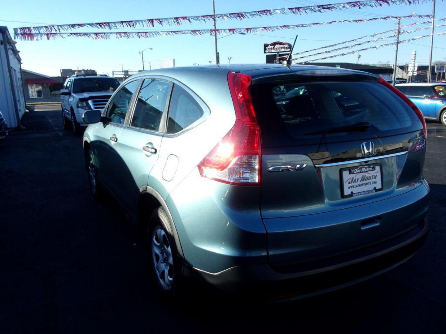 2014 BLUE HONDA CR-V LX (5J6RM4H36EL) with an 2.4L engine, Automatic transmission, located at 501 E. Columbia St., Springfield, OH, 45503, (800) 262-7122, 39.925262, -83.801796 - *** LX *** All Wheel Drive *** Serviced and Detailed *** Updated Timing Chain Service *** Jay North Auto has offered hand picked vehicles since 1965! Our customer's enjoy a NO pressure buying experience with a small town feel. All of our vehicles get fully inspected and detailed. We are a prefe - Photo#5