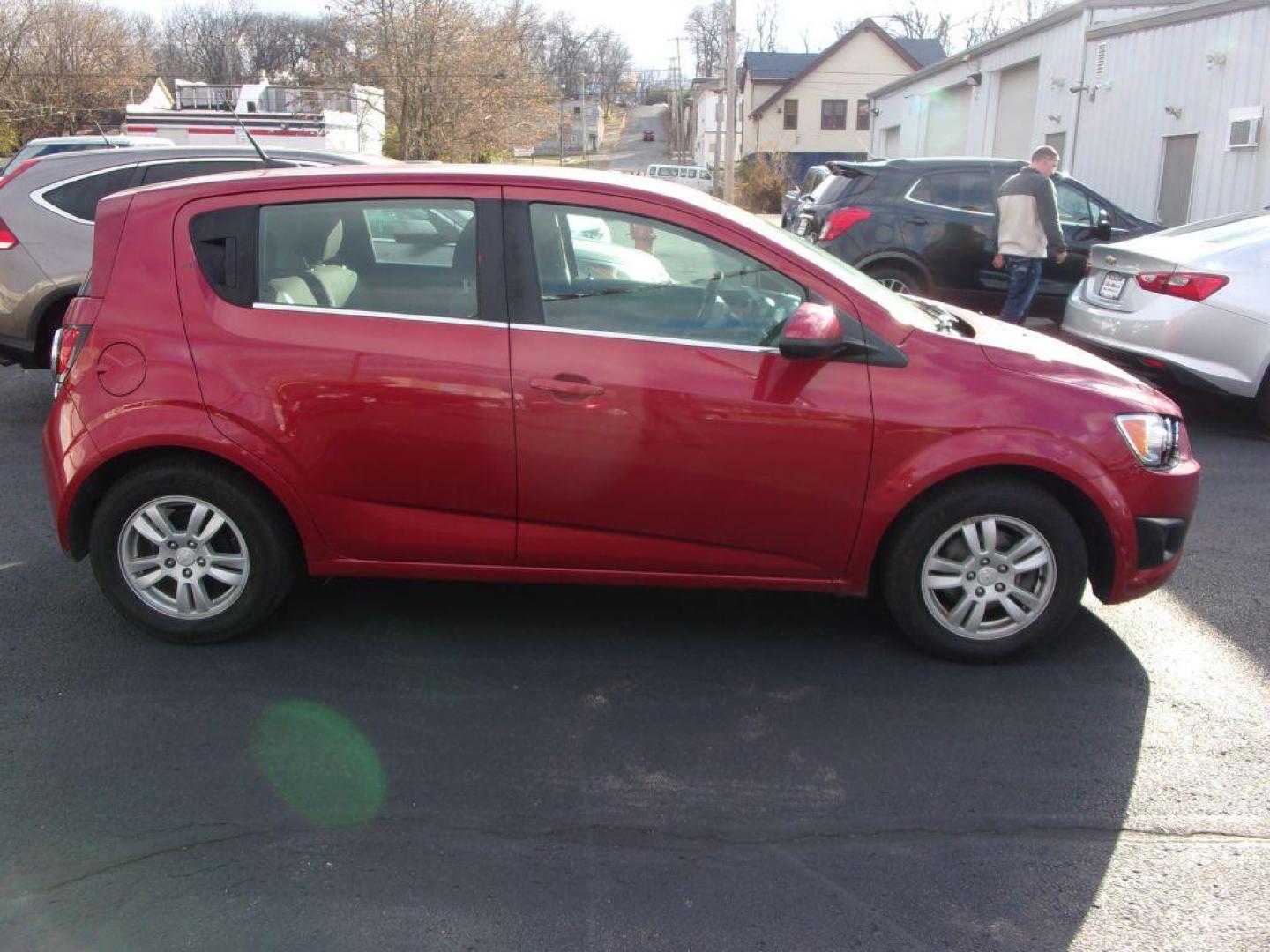 2014 RED CHEVROLET SONIC LT (1G1JC6SH6E4) with an 1.8L engine, Automatic transmission, located at 501 E. Columbia St., Springfield, OH, 45503, (800) 262-7122, 39.925262, -83.801796 - Photo#0