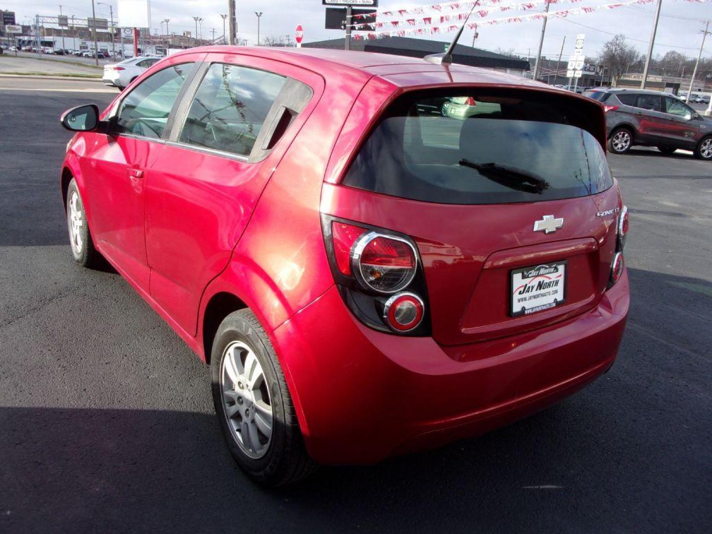 2014 RED CHEVROLET SONIC LT (1G1JC6SH6E4) with an 1.8L engine, Automatic transmission, located at 501 E. Columbia St., Springfield, OH, 45503, (800) 262-7122, 39.925262, -83.801796 - Photo#4