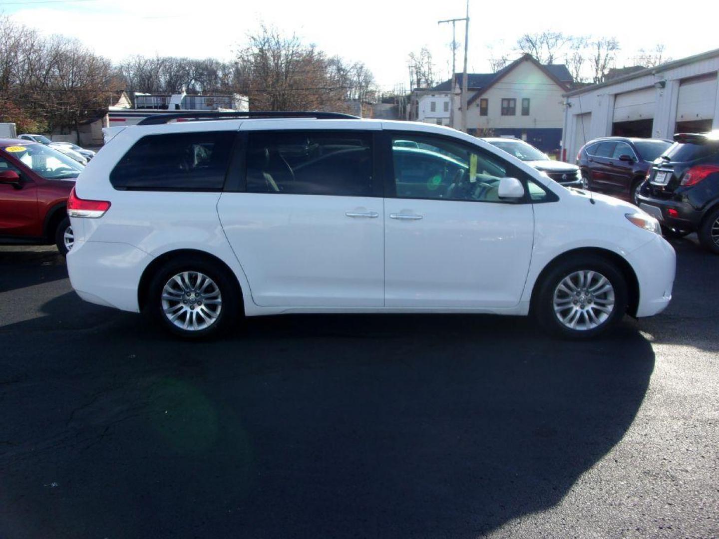 2012 WHITE TOYOTA SIENNA XLE (5TDYK3DC0CS) with an 3.5L engine, Automatic transmission, located at 501 E. Columbia St., Springfield, OH, 45503, (800) 262-7122, 39.925262, -83.801796 - *** XLE *** Serviced and Detailed *** V6 *** Power Doors *** Power Rear Lift Gate *** Clean CarFax *** Moonroof *** Jay North Auto has offered hand picked vehicles since 1965! Our customer's enjoy a NO pressure buying experience with a small town feel. All of our vehicles get fully inspected an - Photo#0