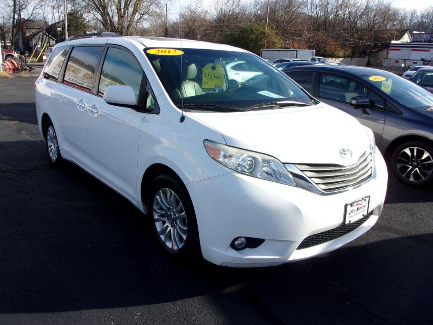 2012 WHITE TOYOTA SIENNA XLE (5TDYK3DC0CS) with an 3.5L engine, Automatic transmission, located at 501 E. Columbia St., Springfield, OH, 45503, (800) 262-7122, 39.925262, -83.801796 - *** XLE *** Serviced and Detailed *** V6 *** Power Doors *** Power Rear Lift Gate *** Clean CarFax *** Moonroof *** Jay North Auto has offered hand picked vehicles since 1965! Our customer's enjoy a NO pressure buying experience with a small town feel. All of our vehicles get fully inspected an - Photo#1