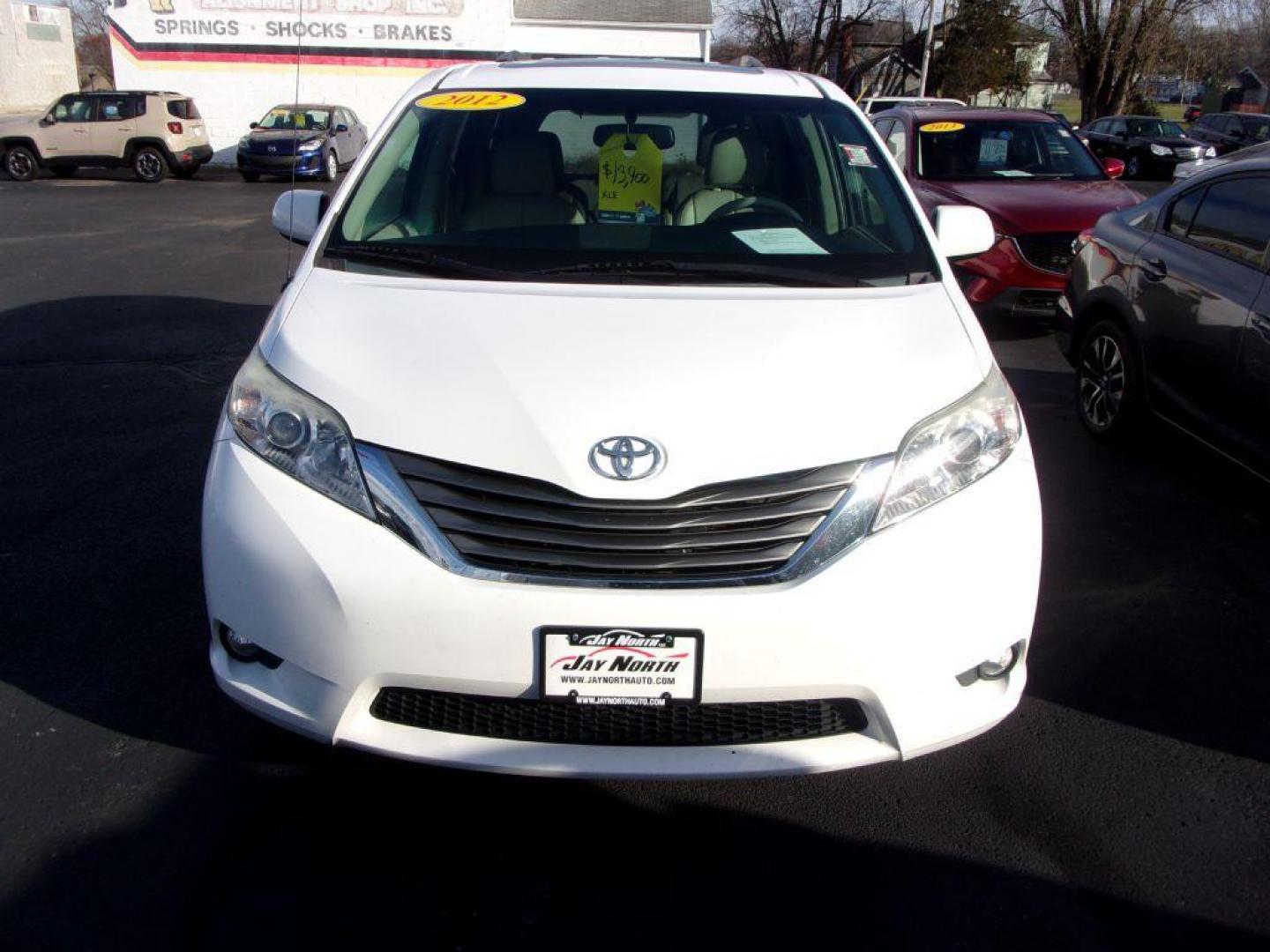 2012 WHITE TOYOTA SIENNA XLE (5TDYK3DC0CS) with an 3.5L engine, Automatic transmission, located at 501 E. Columbia St., Springfield, OH, 45503, (800) 262-7122, 39.925262, -83.801796 - *** XLE *** Serviced and Detailed *** V6 *** Power Doors *** Power Rear Lift Gate *** Clean CarFax *** Moonroof *** Jay North Auto has offered hand picked vehicles since 1965! Our customer's enjoy a NO pressure buying experience with a small town feel. All of our vehicles get fully inspected an - Photo#2