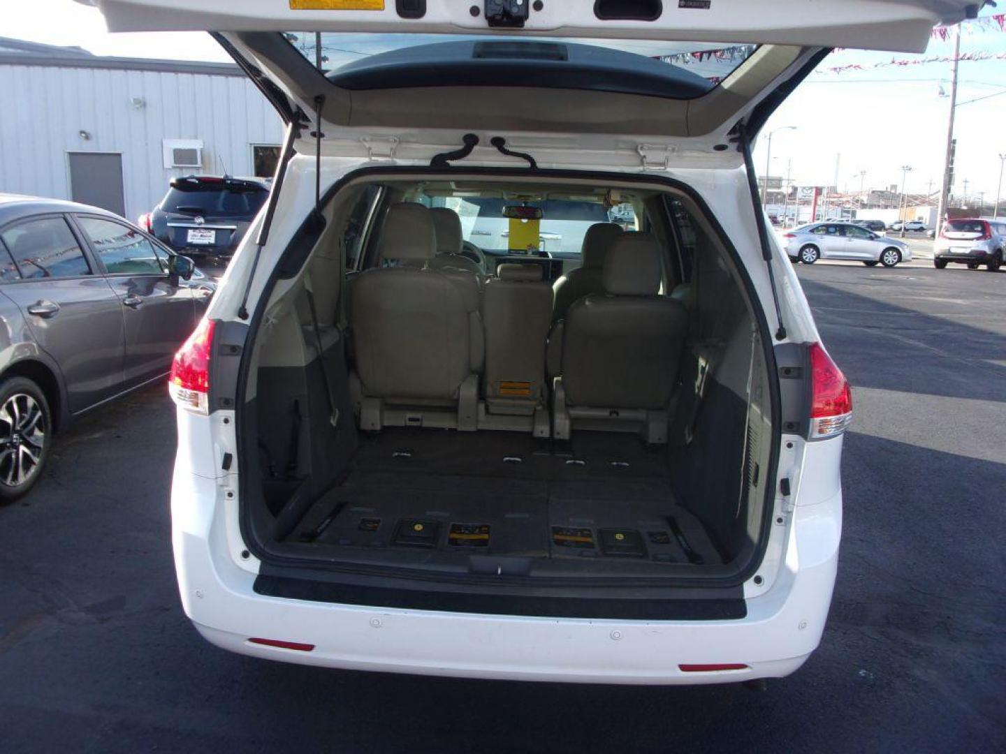 2012 WHITE TOYOTA SIENNA XLE (5TDYK3DC0CS) with an 3.5L engine, Automatic transmission, located at 501 E. Columbia St., Springfield, OH, 45503, (800) 262-7122, 39.925262, -83.801796 - *** XLE *** Serviced and Detailed *** V6 *** Power Doors *** Power Rear Lift Gate *** Clean CarFax *** Moonroof *** Jay North Auto has offered hand picked vehicles since 1965! Our customer's enjoy a NO pressure buying experience with a small town feel. All of our vehicles get fully inspected an - Photo#7