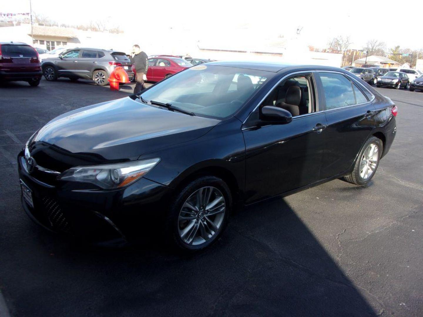 2017 BLACK TOYOTA CAMRY SE (4T1BF1FK4HU) with an 2.5L engine, Automatic transmission, located at 501 E. Columbia St., Springfield, OH, 45503, (800) 262-7122, 39.925262, -83.801796 - *** SE *** Back Up Camera *** Serviced and Detailed *** FWD 2.5L *** Clean CarFax *** Jay North Auto has offered hand picked vehicles since 1965! Our customer's enjoy a NO pressure buying experience with a small town feel. All of our vehicles get fully inspected and detailed. We are a preferred - Photo#2