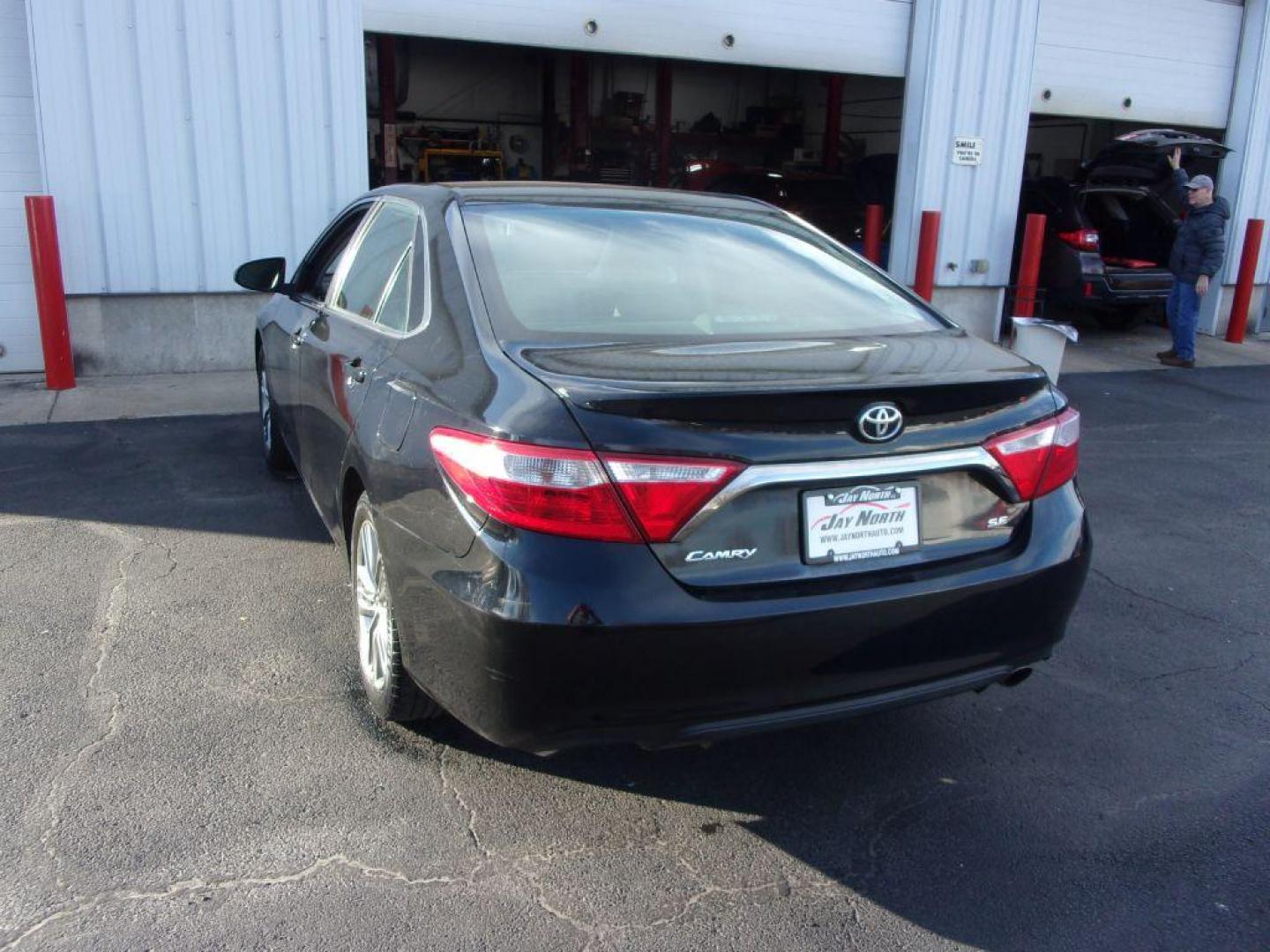 2017 BLACK TOYOTA CAMRY SE (4T1BF1FK4HU) with an 2.5L engine, Automatic transmission, located at 501 E. Columbia St., Springfield, OH, 45503, (800) 262-7122, 39.925262, -83.801796 - *** SE *** Back Up Camera *** Serviced and Detailed *** FWD 2.5L *** Clean CarFax *** Jay North Auto has offered hand picked vehicles since 1965! Our customer's enjoy a NO pressure buying experience with a small town feel. All of our vehicles get fully inspected and detailed. We are a preferred - Photo#3