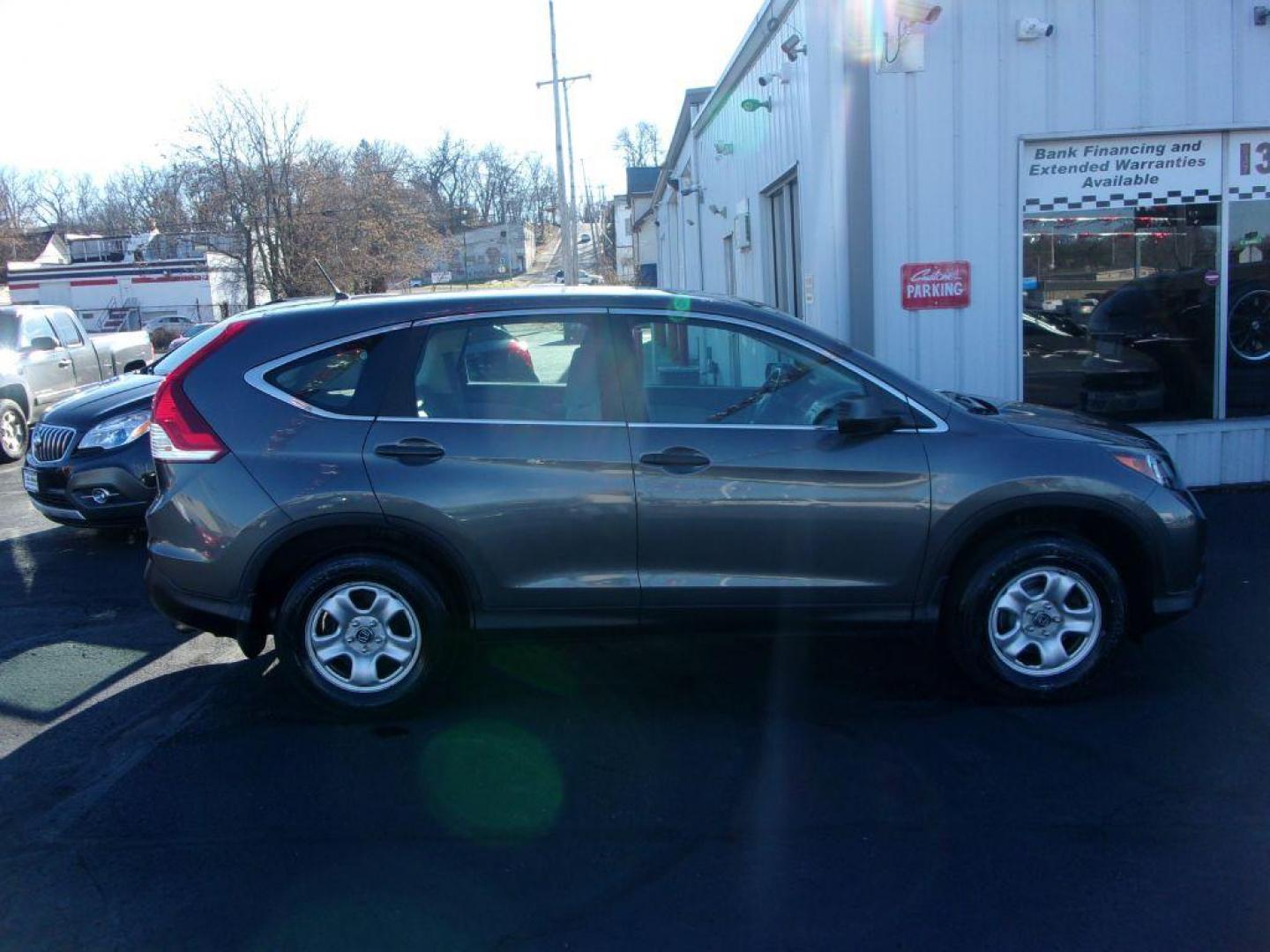 2013 GRAY HONDA CR-V LX (5J6RM4H34DL) with an 2.4L engine, Automatic transmission, located at 501 E. Columbia St., Springfield, OH, 45503, (800) 262-7122, 39.925262, -83.801796 - *** 1 Owner w/ Clean CarFax *** Regular Oil Changes *** Serviced and Detailed *** New Tires *** All Wheel Drive *** Jay North Auto has offered hand picked vehicles since 1965! Our customer's enjoy a NO pressure buying experience with a small town feel. All of our vehicles get fully inspected and - Photo#0