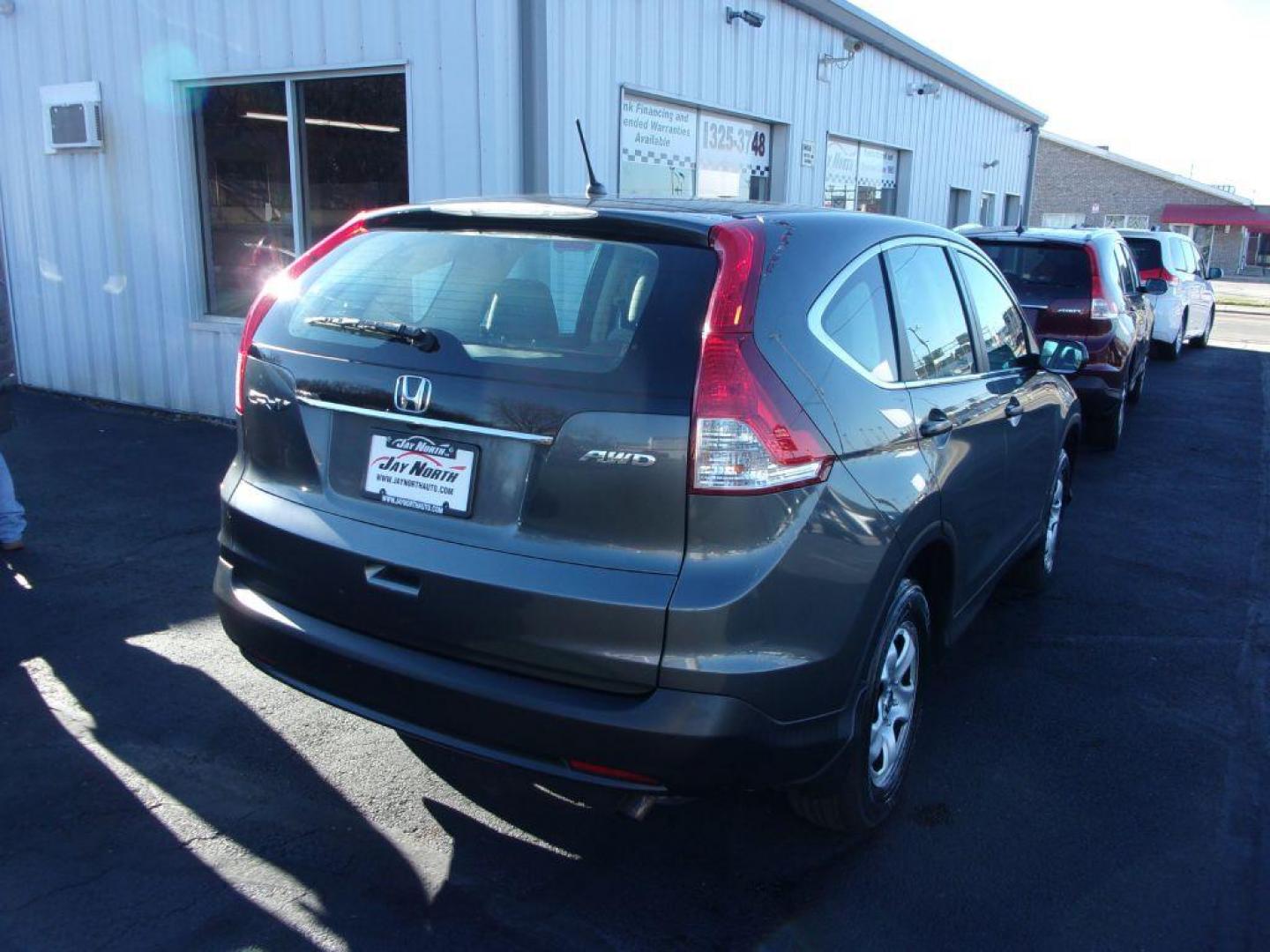 2013 GRAY HONDA CR-V LX (5J6RM4H34DL) with an 2.4L engine, Automatic transmission, located at 501 E. Columbia St., Springfield, OH, 45503, (800) 262-7122, 39.925262, -83.801796 - *** 1 Owner w/ Clean CarFax *** Regular Oil Changes *** Serviced and Detailed *** New Tires *** All Wheel Drive *** Jay North Auto has offered hand picked vehicles since 1965! Our customer's enjoy a NO pressure buying experience with a small town feel. All of our vehicles get fully inspected and - Photo#3