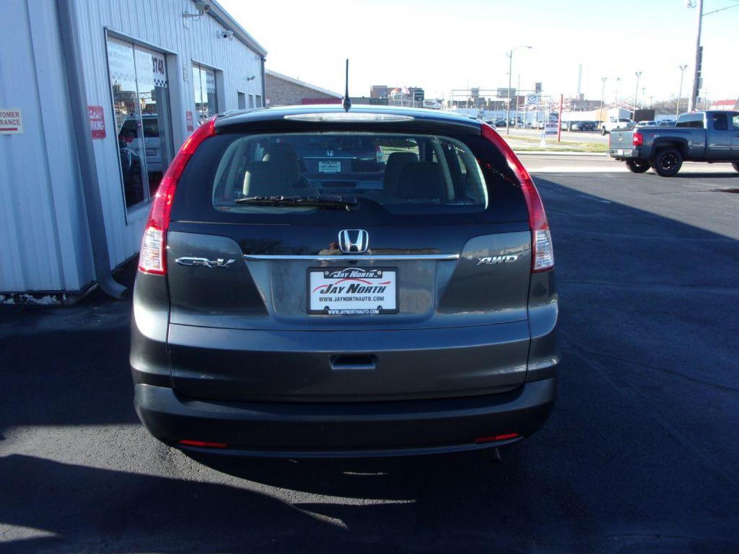 2013 GRAY HONDA CR-V LX (5J6RM4H34DL) with an 2.4L engine, Automatic transmission, located at 501 E. Columbia St., Springfield, OH, 45503, (800) 262-7122, 39.925262, -83.801796 - *** 1 Owner w/ Clean CarFax *** Regular Oil Changes *** Serviced and Detailed *** New Tires *** All Wheel Drive *** Jay North Auto has offered hand picked vehicles since 1965! Our customer's enjoy a NO pressure buying experience with a small town feel. All of our vehicles get fully inspected and - Photo#4