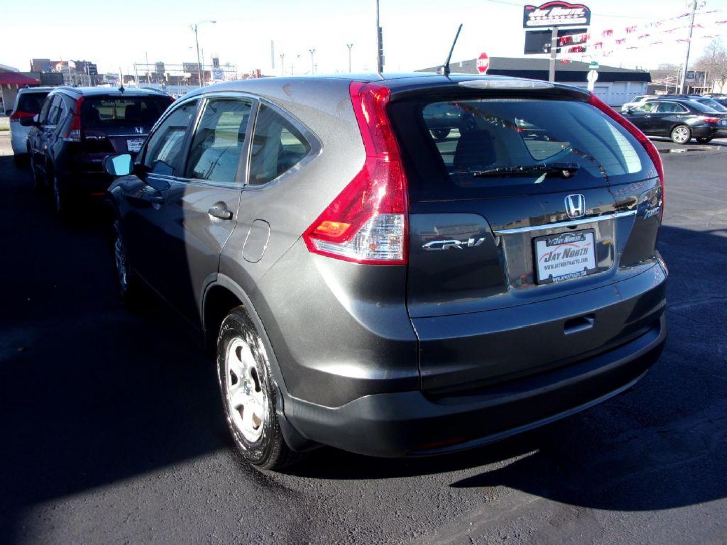 2013 GRAY HONDA CR-V LX (5J6RM4H34DL) with an 2.4L engine, Automatic transmission, located at 501 E. Columbia St., Springfield, OH, 45503, (800) 262-7122, 39.925262, -83.801796 - *** 1 Owner w/ Clean CarFax *** Regular Oil Changes *** Serviced and Detailed *** New Tires *** All Wheel Drive *** Jay North Auto has offered hand picked vehicles since 1965! Our customer's enjoy a NO pressure buying experience with a small town feel. All of our vehicles get fully inspected and - Photo#5