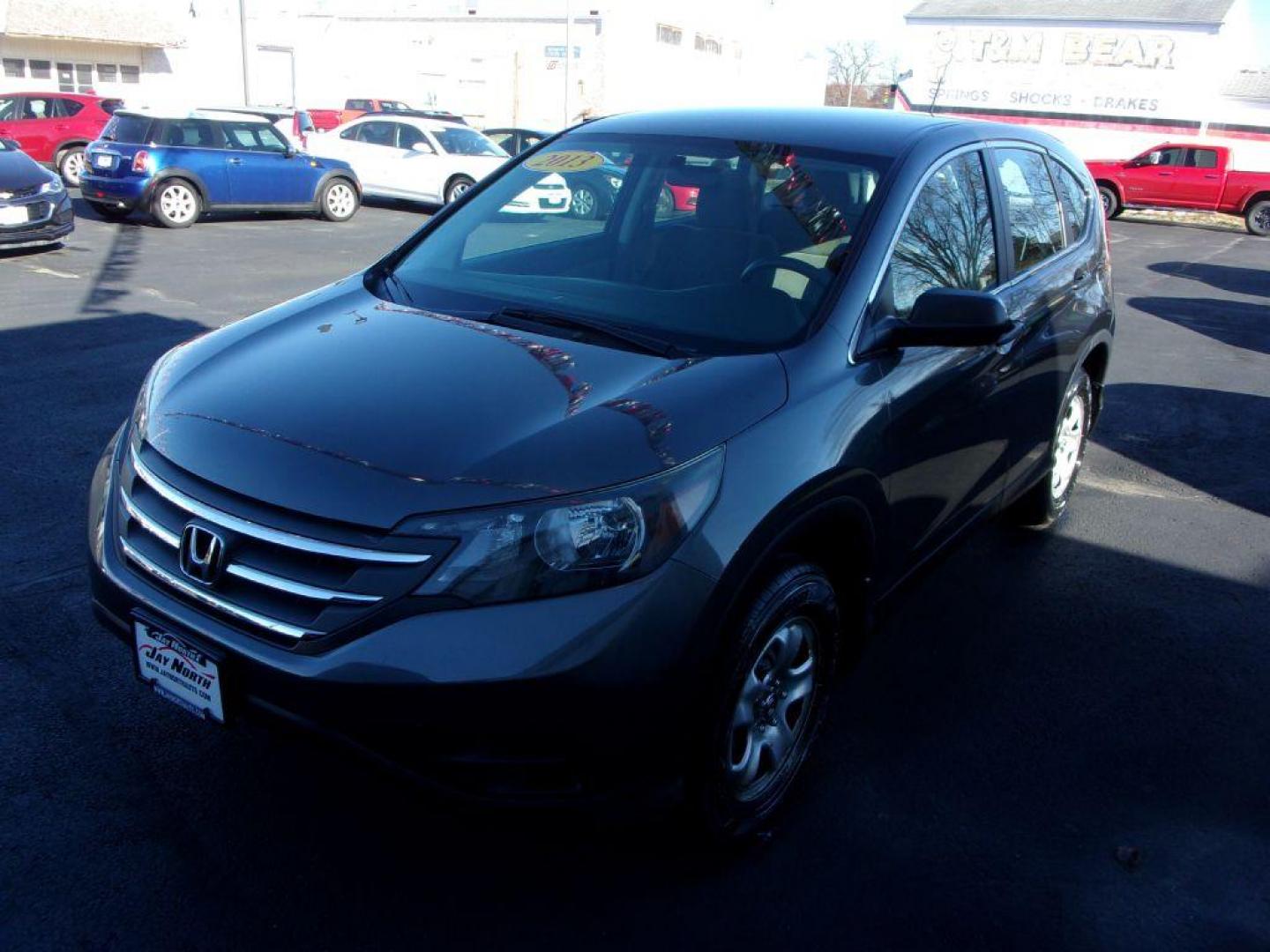 2013 GRAY HONDA CR-V LX (5J6RM4H34DL) with an 2.4L engine, Automatic transmission, located at 501 E. Columbia St., Springfield, OH, 45503, (800) 262-7122, 39.925262, -83.801796 - *** 1 Owner w/ Clean CarFax *** Regular Oil Changes *** Serviced and Detailed *** New Tires *** All Wheel Drive *** Jay North Auto has offered hand picked vehicles since 1965! Our customer's enjoy a NO pressure buying experience with a small town feel. All of our vehicles get fully inspected and - Photo#6