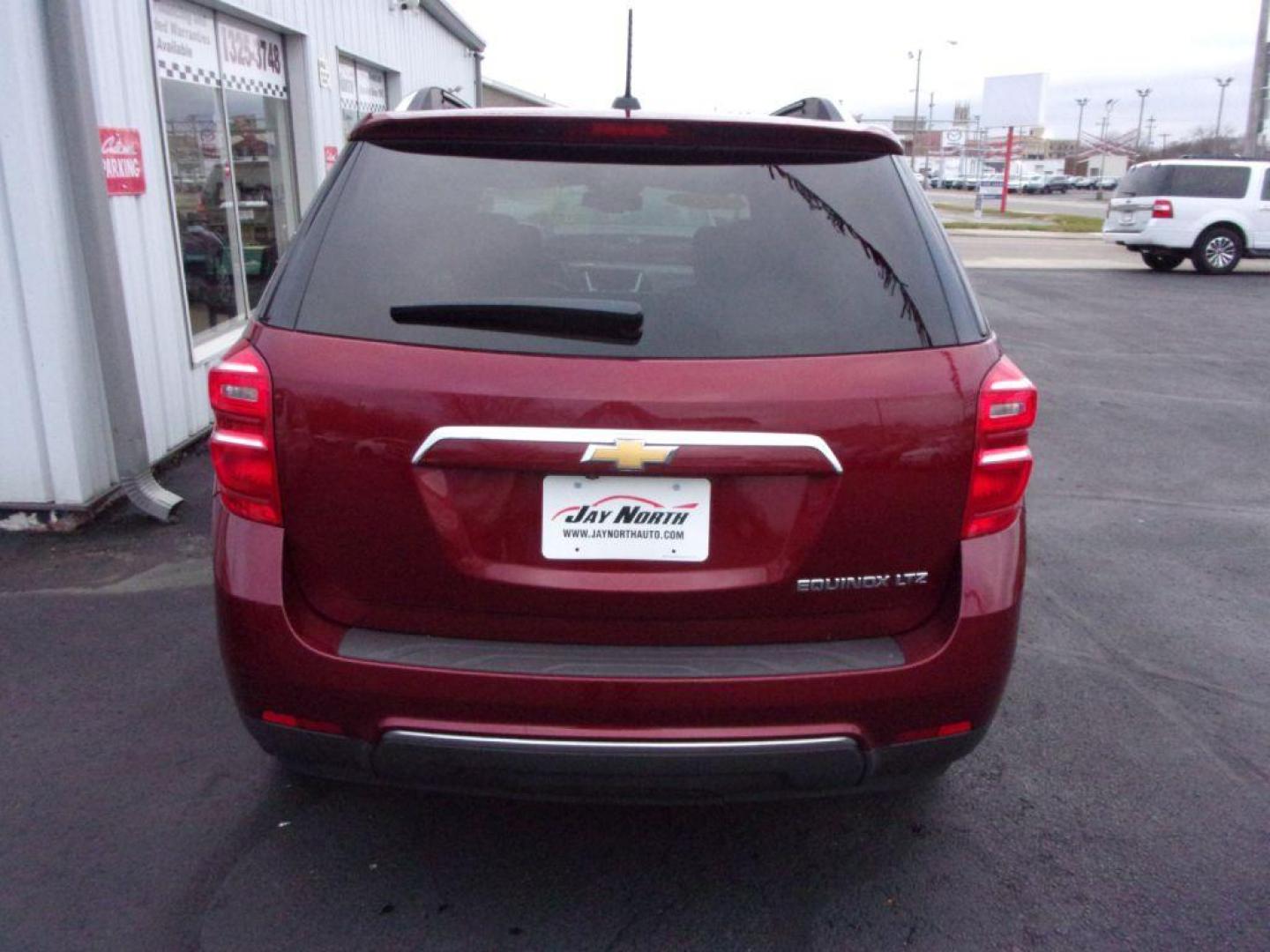 2016 RED CHEVROLET EQUINOX LTZ (2GNALDEK4G1) with an 2.4L engine, Automatic transmission, located at 501 E. Columbia St., Springfield, OH, 45503, (800) 262-7122, 39.925262, -83.801796 - *** LTZ *** Serviced and Detailed *** Jay North Auto has offered hand picked vehicles since 1965! Our customer's enjoy a NO pressure buying experience with a small town feel. All of our vehicles get fully inspected and detailed. We are a preferred dealer for many local credit unions and lenders - Photo#3