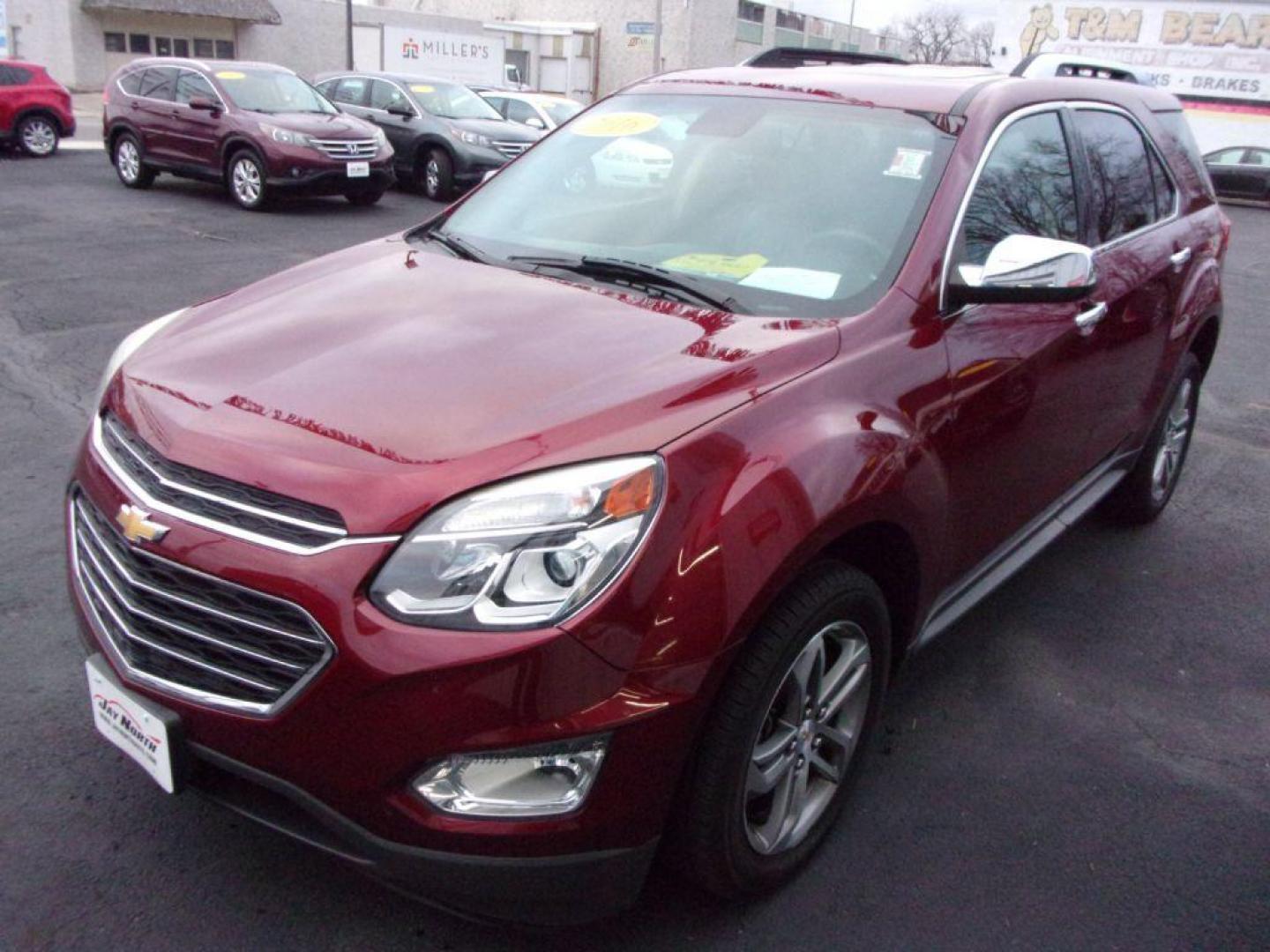 2016 RED CHEVROLET EQUINOX LTZ (2GNALDEK4G1) with an 2.4L engine, Automatic transmission, located at 501 E. Columbia St., Springfield, OH, 45503, (800) 262-7122, 39.925262, -83.801796 - *** LTZ *** Serviced and Detailed *** Jay North Auto has offered hand picked vehicles since 1965! Our customer's enjoy a NO pressure buying experience with a small town feel. All of our vehicles get fully inspected and detailed. We are a preferred dealer for many local credit unions and lenders - Photo#5