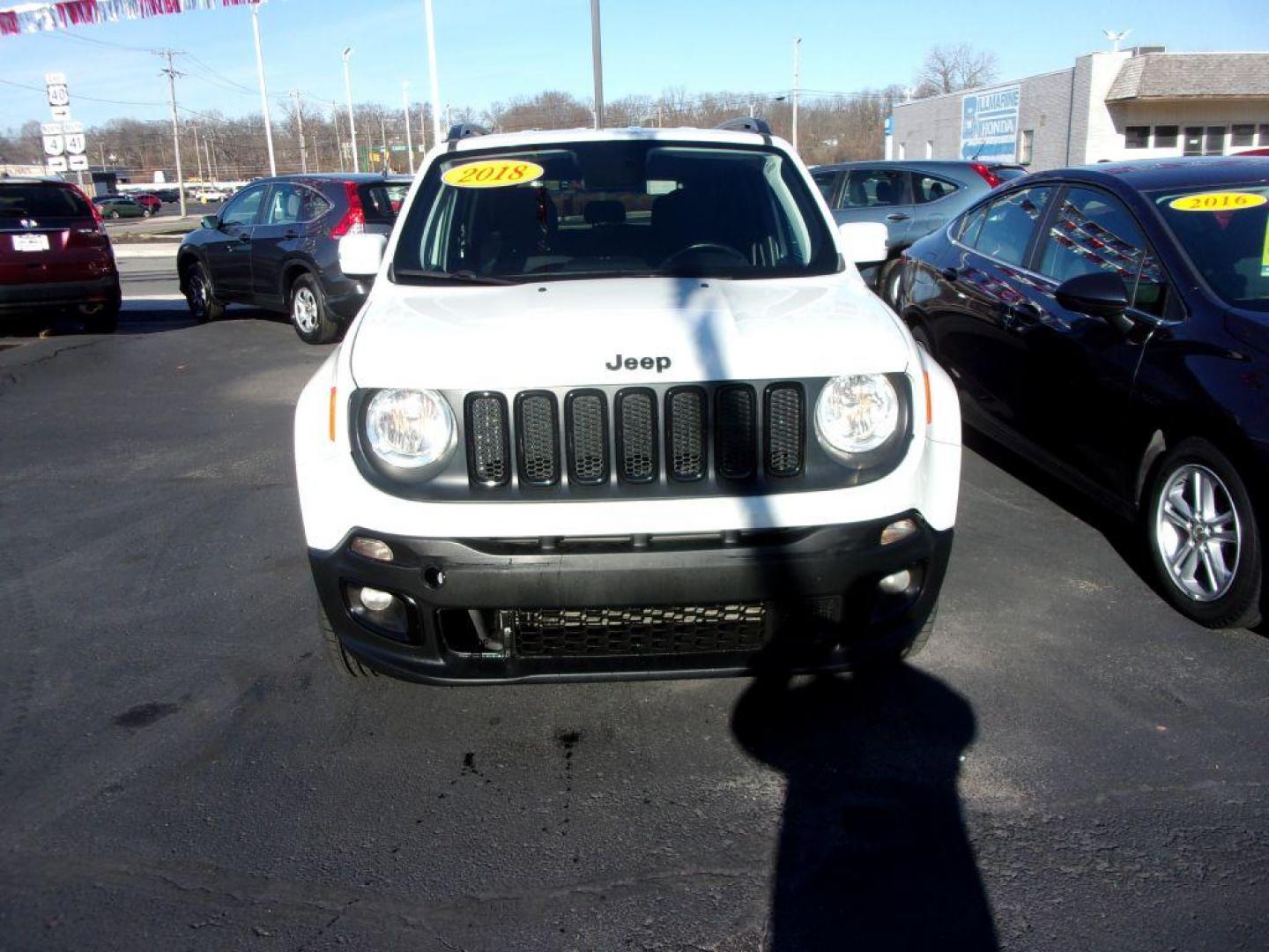 2018 WHITE JEEP RENEGADE ALTITUDE (ZACCJBBB8JP) with an 2.4L engine, Automatic transmission, located at 501 E. Columbia St., Springfield, OH, 45503, (800) 262-7122, 39.925262, -83.801796 - *** New Tires *** Serviced and Detailed *** Customer Preferred Package 2EL Deluxe Cloth High-Back Bucket Seats Altitude Package Black Accent Stitching Exterior Mirrors with Turn Signals 18-Inch x 8.0-Inch Gloss Black Wheels 225/55R18 All Season Tires Black Day Light Opening Moldings Glo - Photo#1