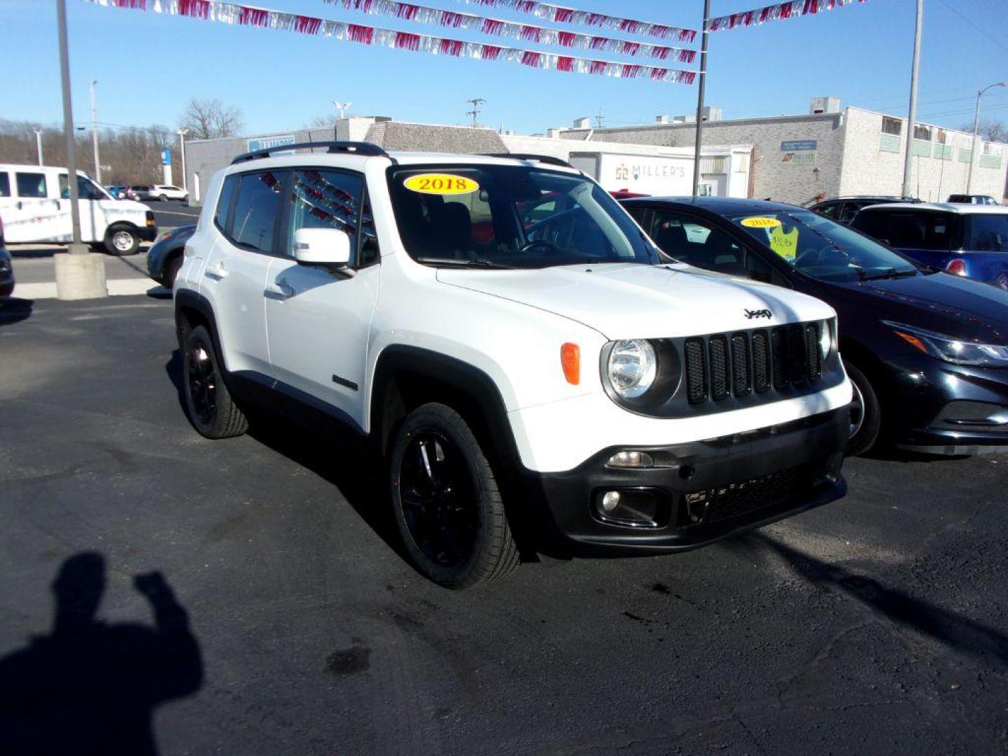 2018 WHITE JEEP RENEGADE ALTITUDE (ZACCJBBB8JP) with an 2.4L engine, Automatic transmission, located at 501 E. Columbia St., Springfield, OH, 45503, (800) 262-7122, 39.925262, -83.801796 - *** New Tires *** Serviced and Detailed *** Customer Preferred Package 2EL Deluxe Cloth High-Back Bucket Seats Altitude Package Black Accent Stitching Exterior Mirrors with Turn Signals 18-Inch x 8.0-Inch Gloss Black Wheels 225/55R18 All Season Tires Black Day Light Opening Moldings Glo - Photo#2