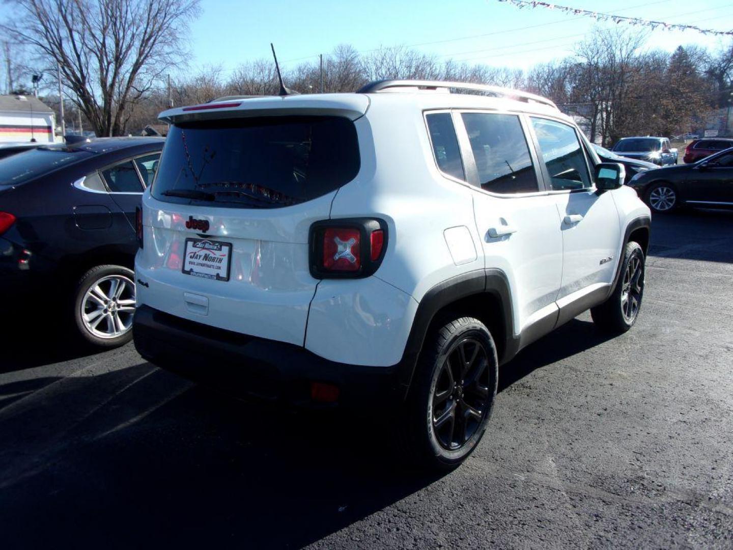 2018 WHITE JEEP RENEGADE ALTITUDE (ZACCJBBB8JP) with an 2.4L engine, Automatic transmission, located at 501 E. Columbia St., Springfield, OH, 45503, (800) 262-7122, 39.925262, -83.801796 - *** New Tires *** Serviced and Detailed *** Customer Preferred Package 2EL Deluxe Cloth High-Back Bucket Seats Altitude Package Black Accent Stitching Exterior Mirrors with Turn Signals 18-Inch x 8.0-Inch Gloss Black Wheels 225/55R18 All Season Tires Black Day Light Opening Moldings Glo - Photo#3