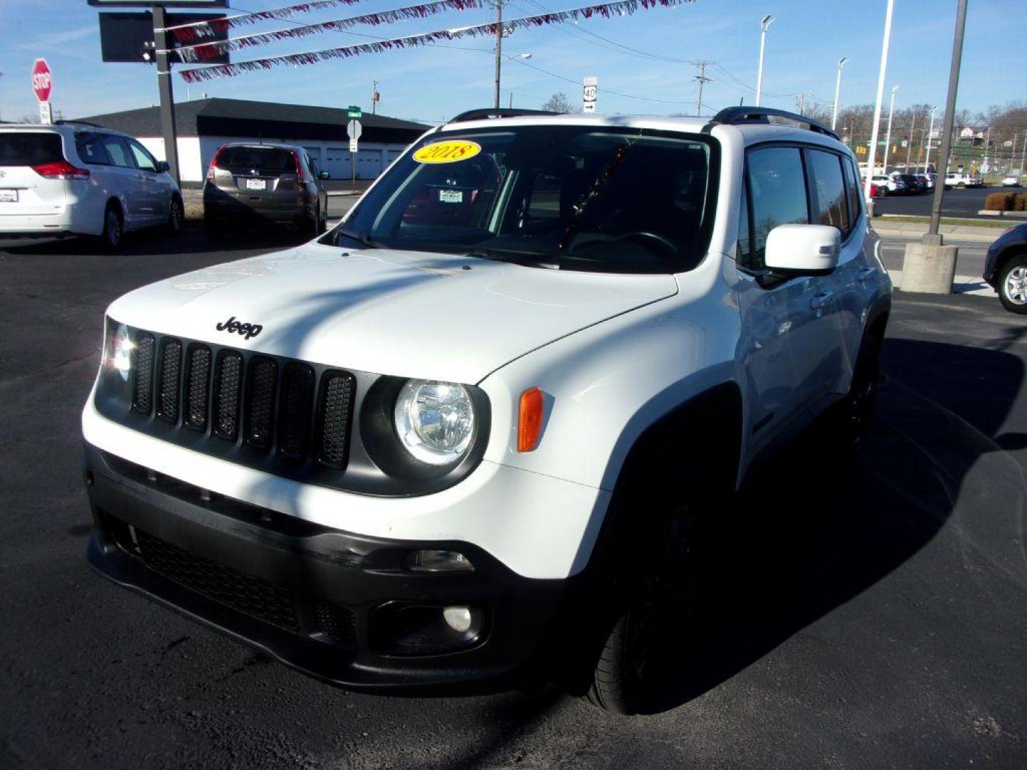 2018 WHITE JEEP RENEGADE ALTITUDE (ZACCJBBB8JP) with an 2.4L engine, Automatic transmission, located at 501 E. Columbia St., Springfield, OH, 45503, (800) 262-7122, 39.925262, -83.801796 - *** New Tires *** Serviced and Detailed *** Customer Preferred Package 2EL Deluxe Cloth High-Back Bucket Seats Altitude Package Black Accent Stitching Exterior Mirrors with Turn Signals 18-Inch x 8.0-Inch Gloss Black Wheels 225/55R18 All Season Tires Black Day Light Opening Moldings Glo - Photo#6